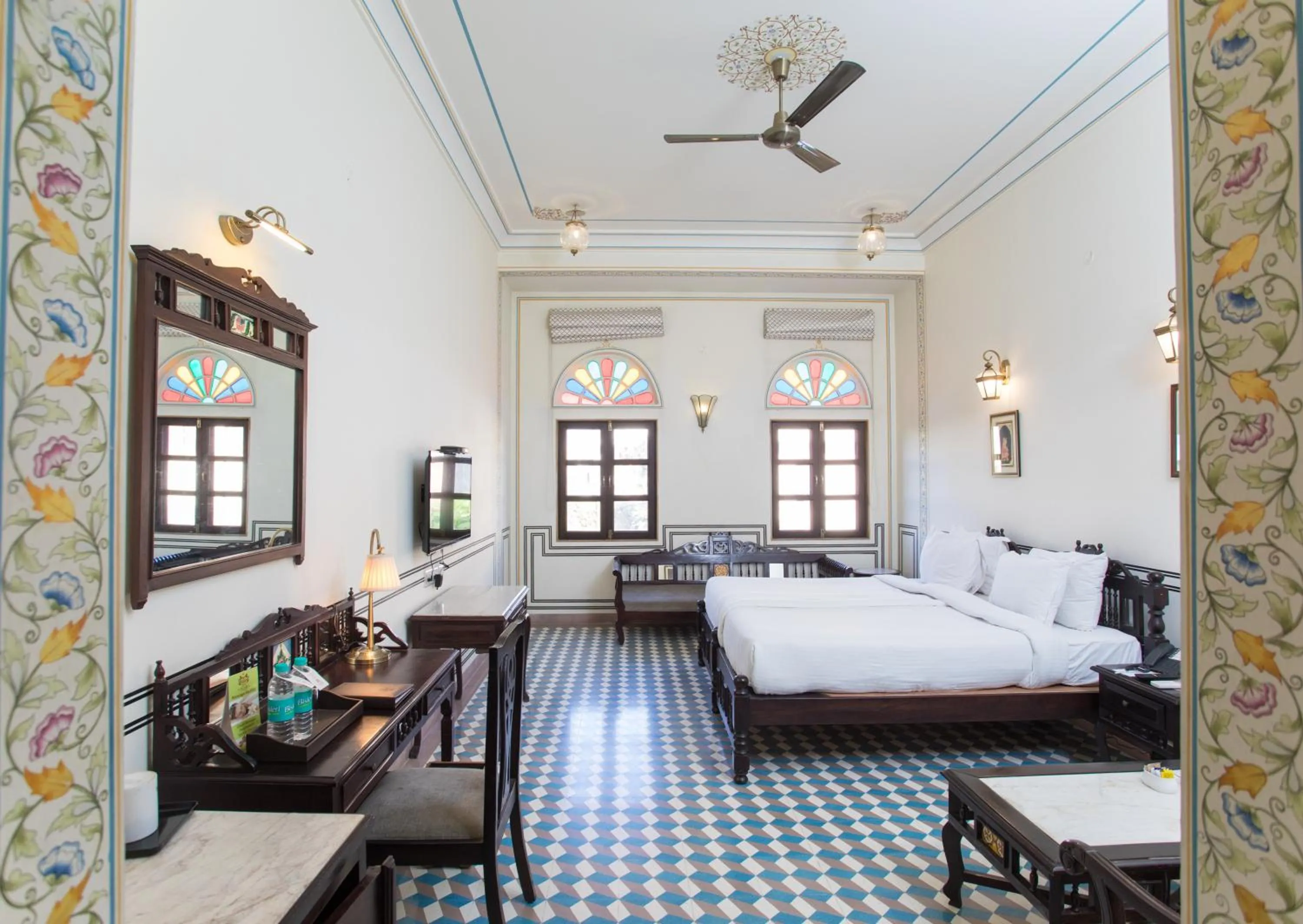 Bed in Grand Uniara A Heritage Hotel