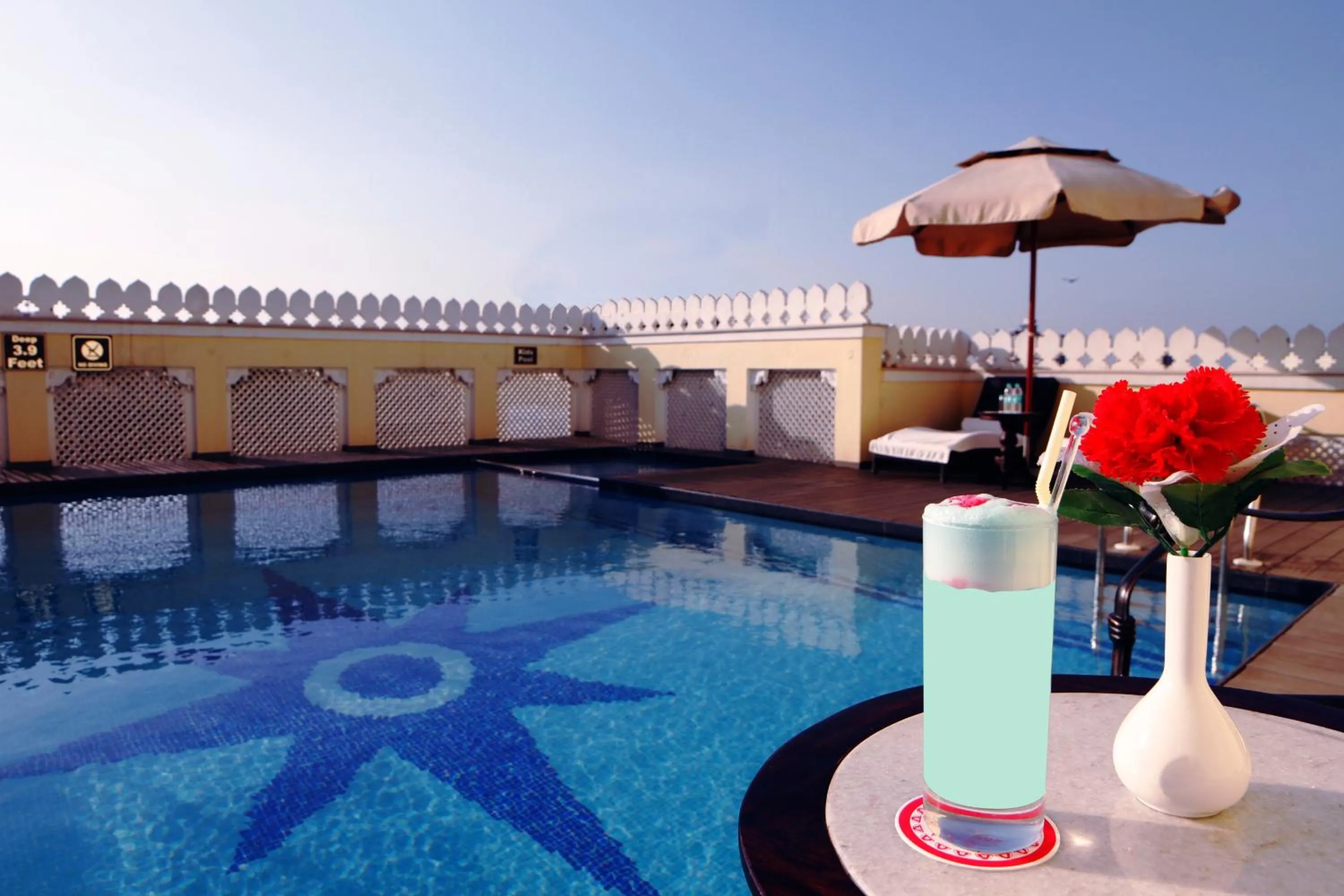 Swimming pool in Grand Uniara A Heritage Hotel