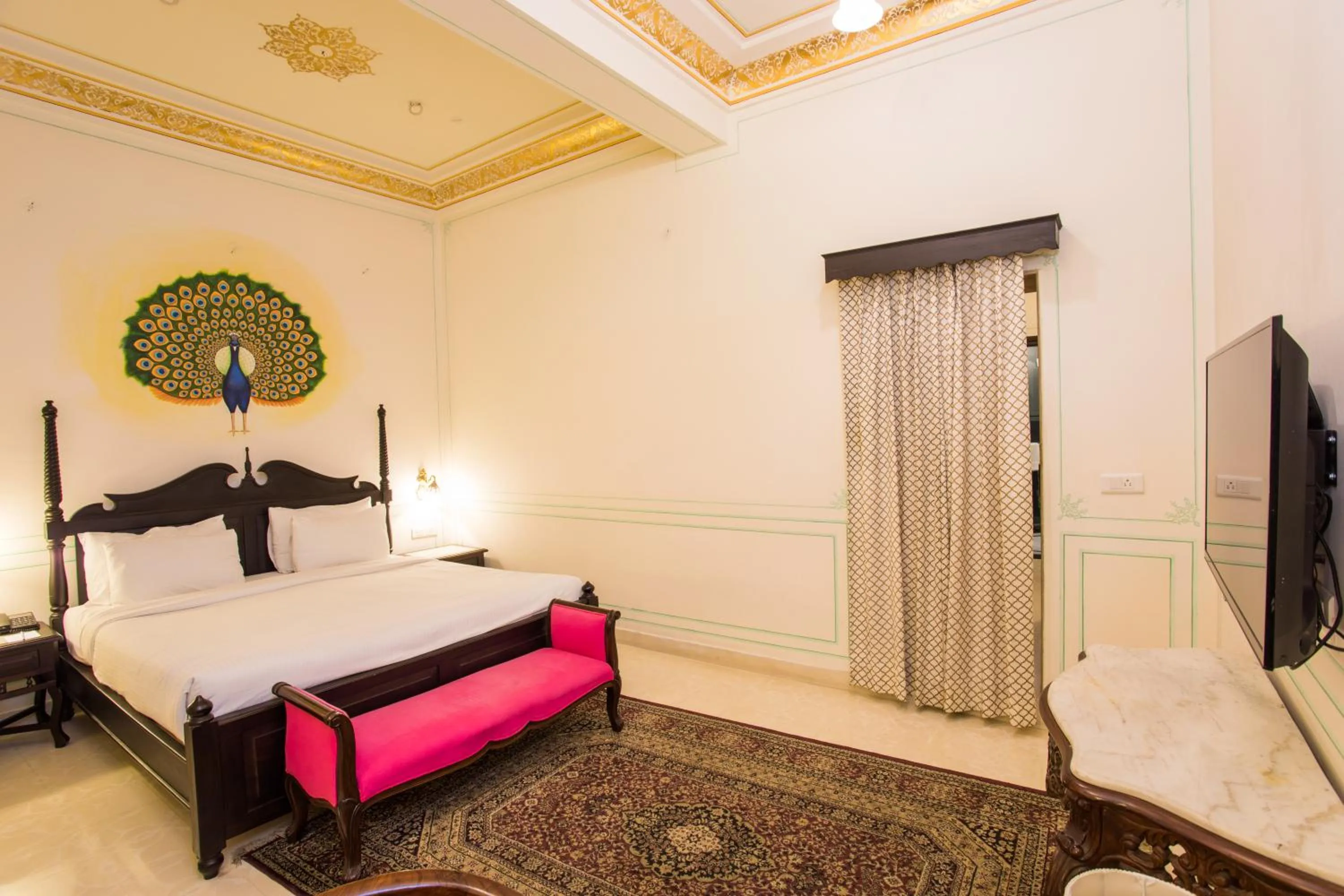 Bed in Grand Uniara A Heritage Hotel