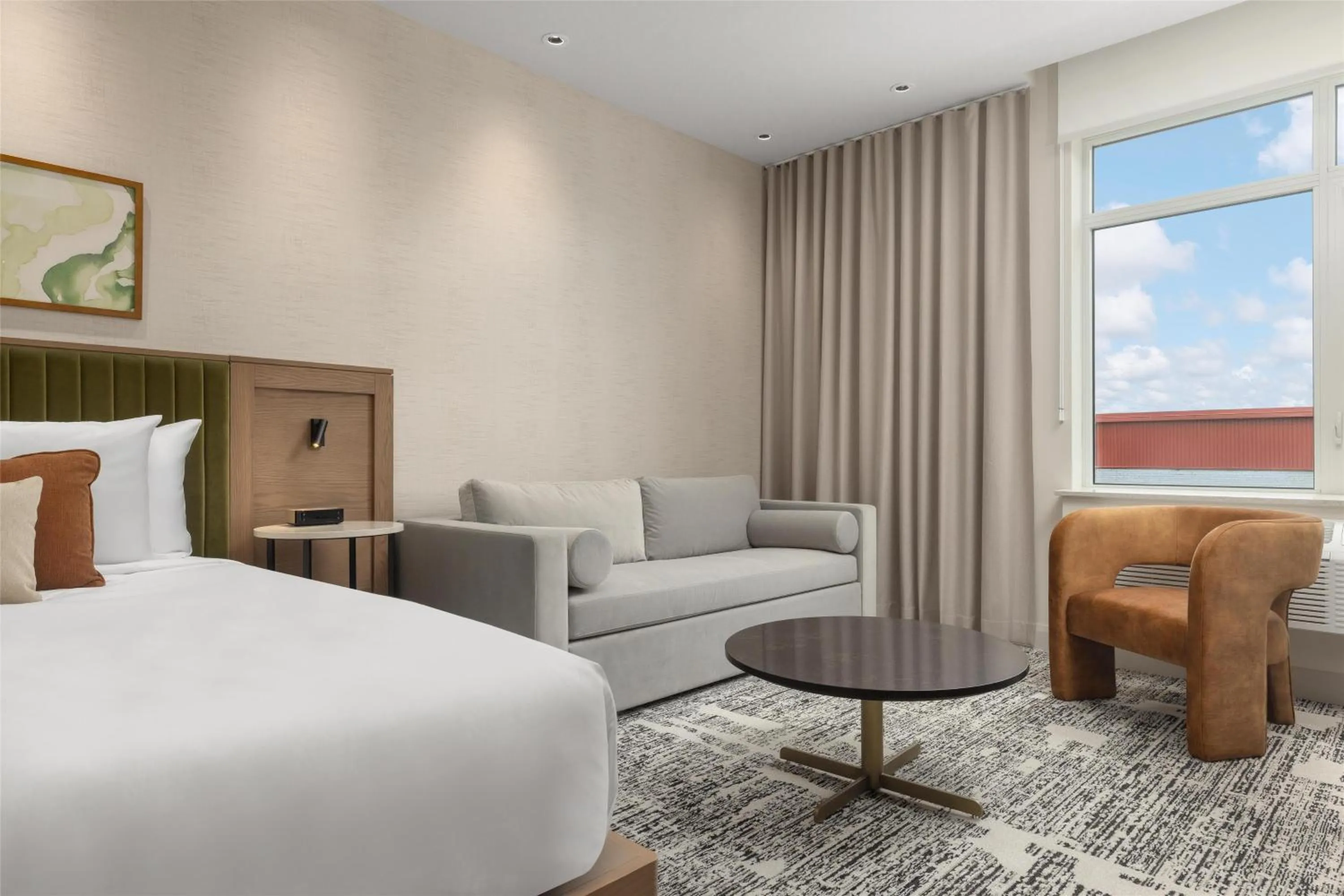 Living room, Bed in Hotel Railwayparc Montreal, Tapestry Collection By Hilton