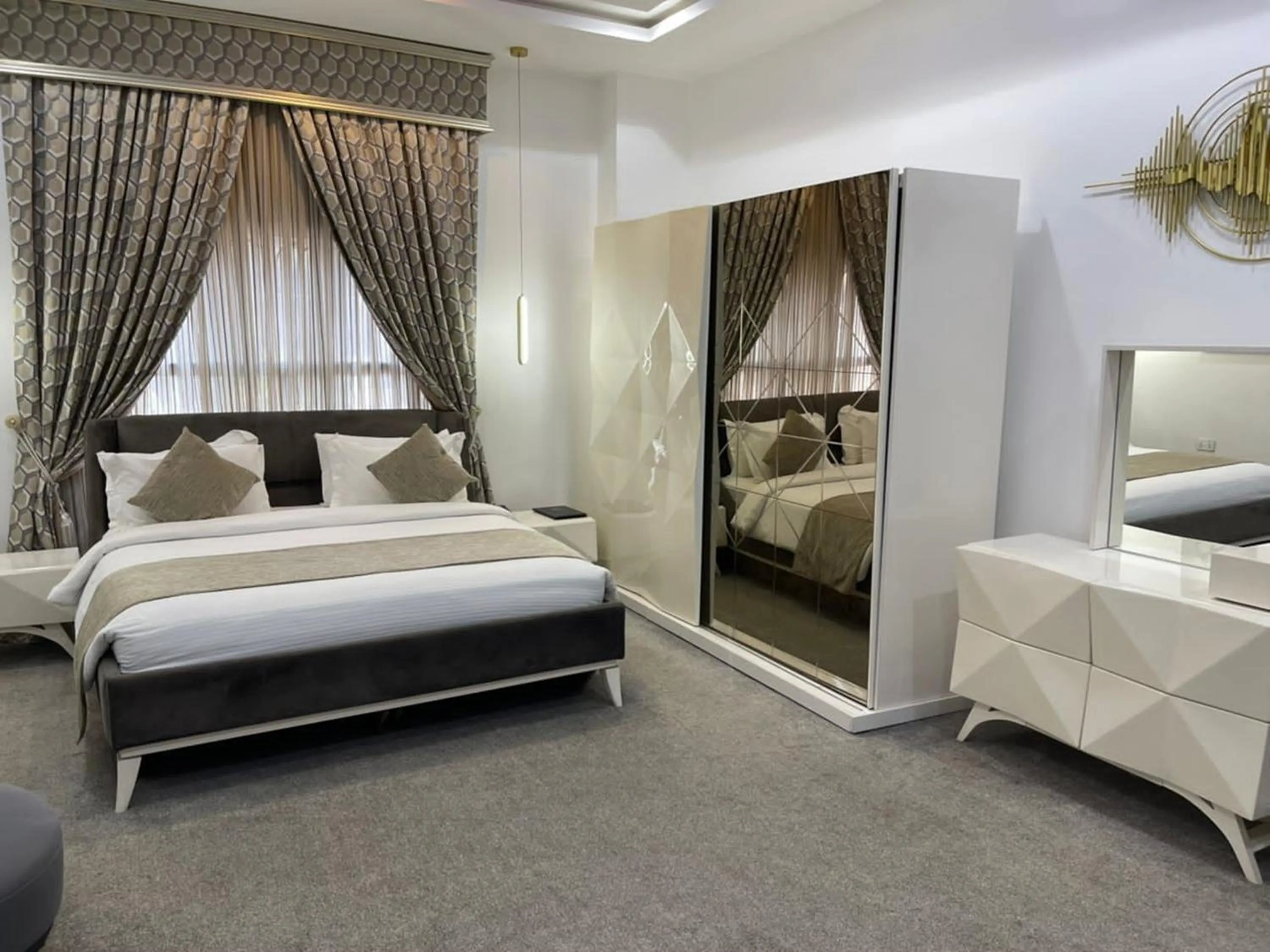 Bed in UrbanEdge Hotel