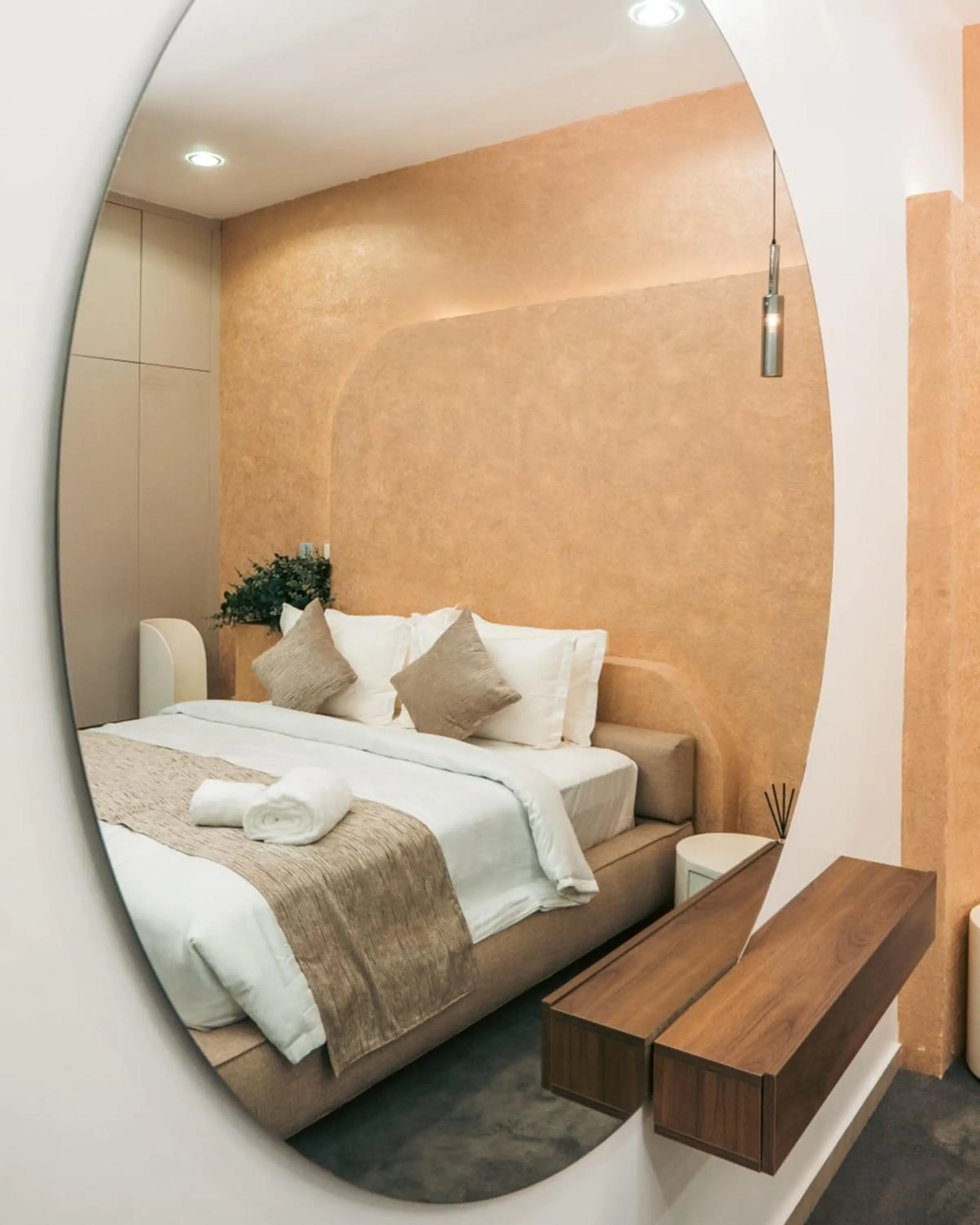 Bed in UrbanEdge Hotel