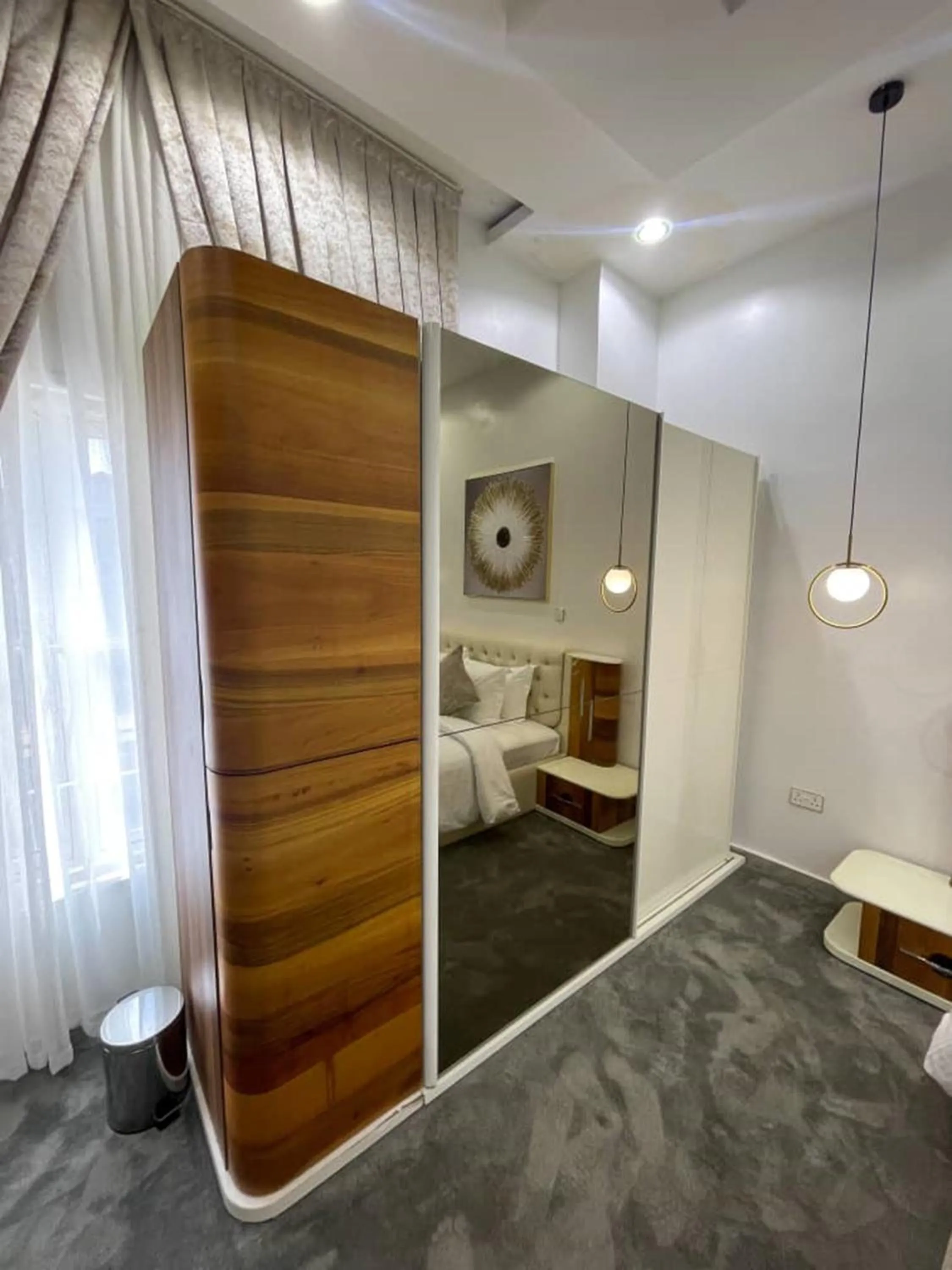 Bed in UrbanEdge Hotel