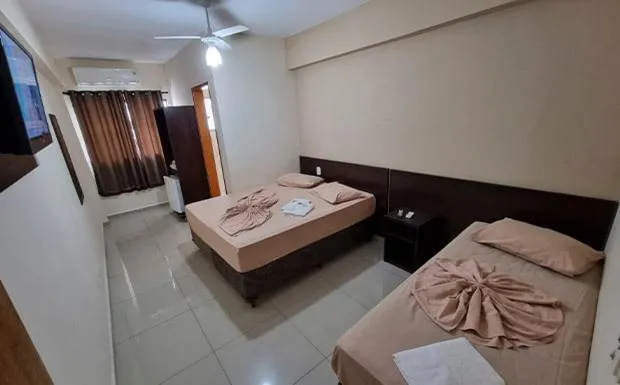 Bed in Portal Palace Hotel