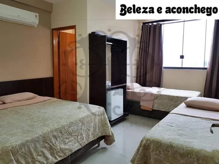 Bed in Portal Palace Hotel