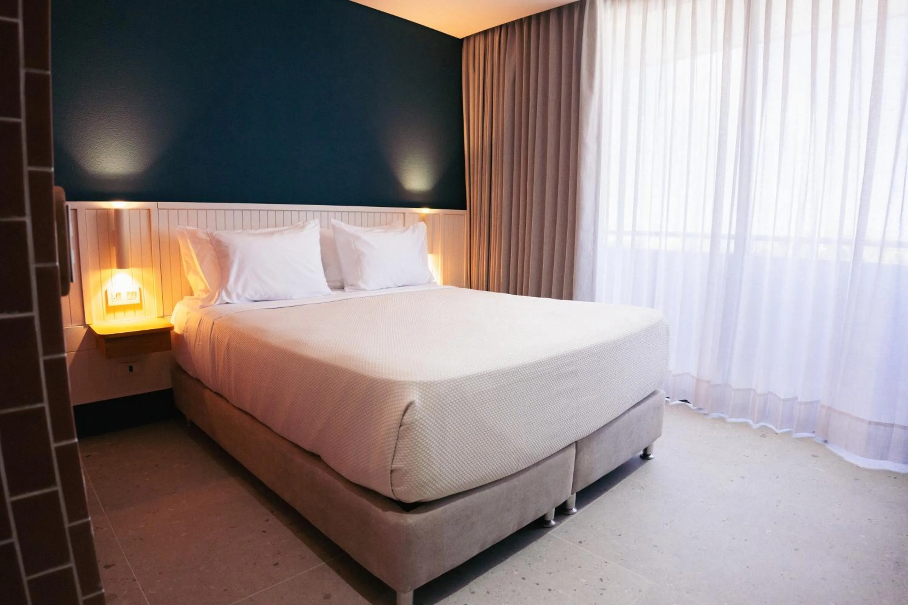 Bed in Zapadilly Tree Hotel