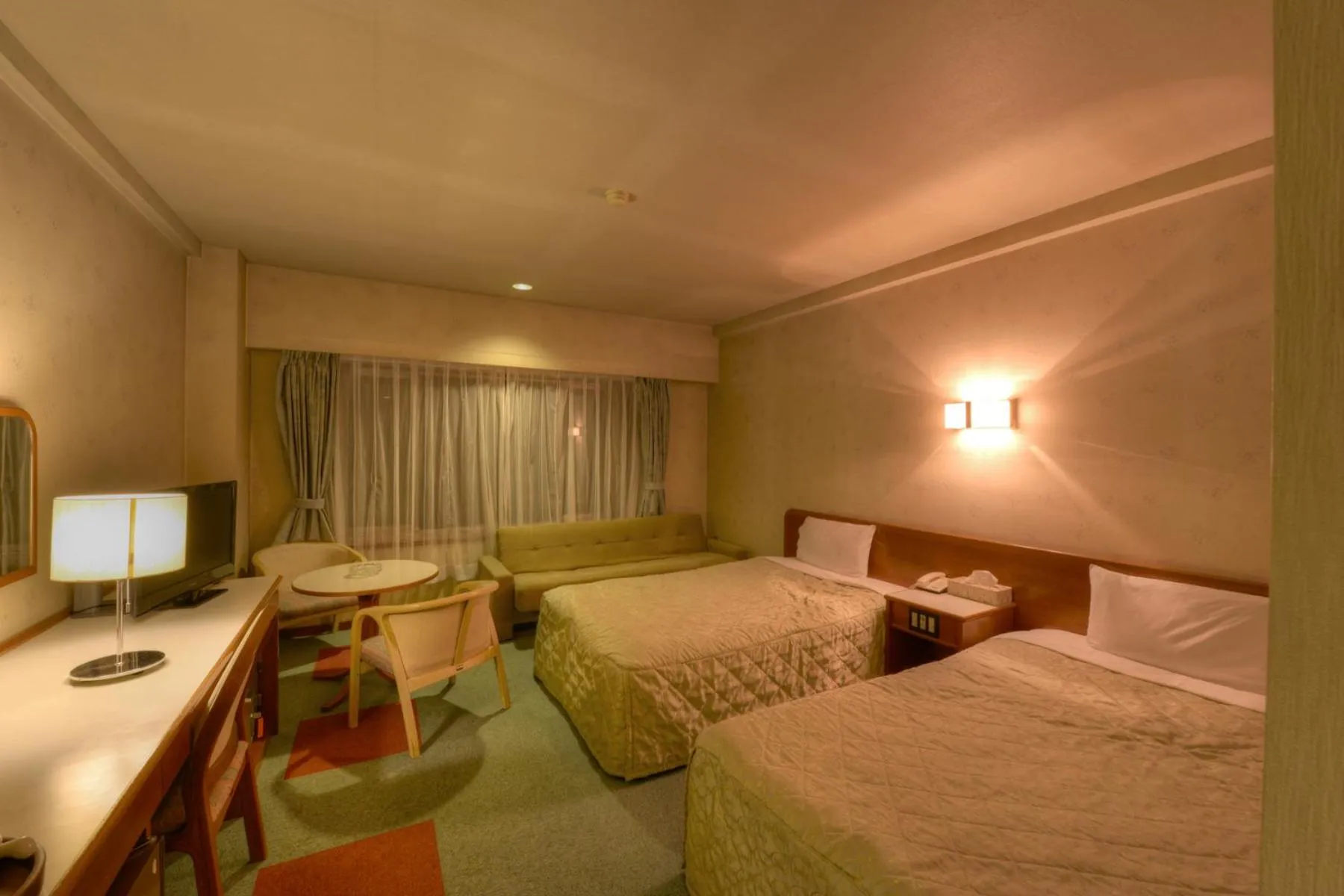 Bed in Shin Kabakawa Kanko Hotel