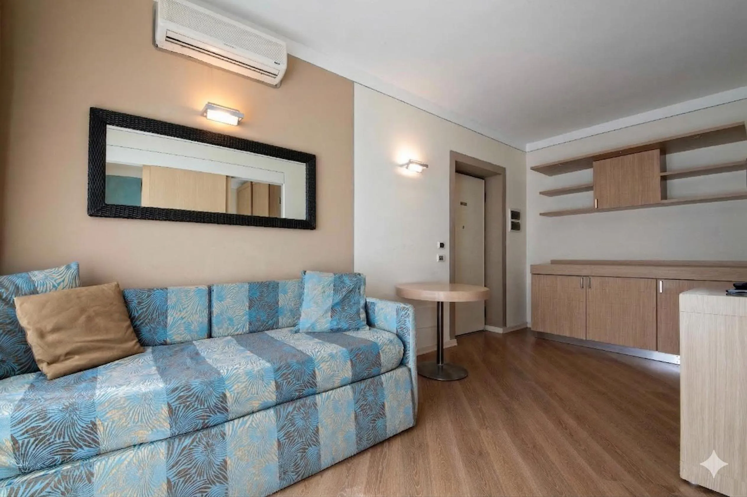 Living room, Bed in Lake Garda Resort