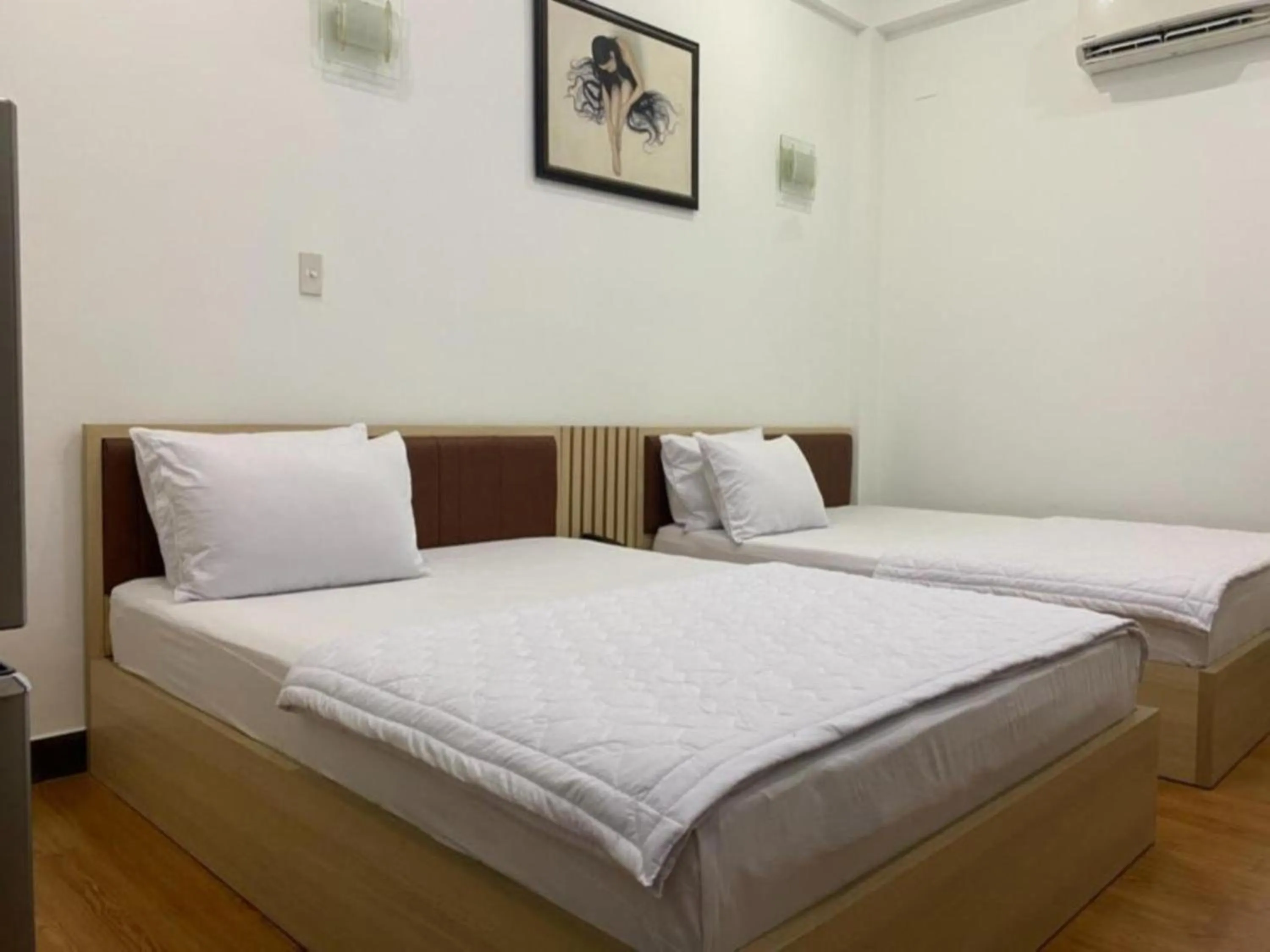 Bed in Minh Hà Hotel Hồ Chí Minh