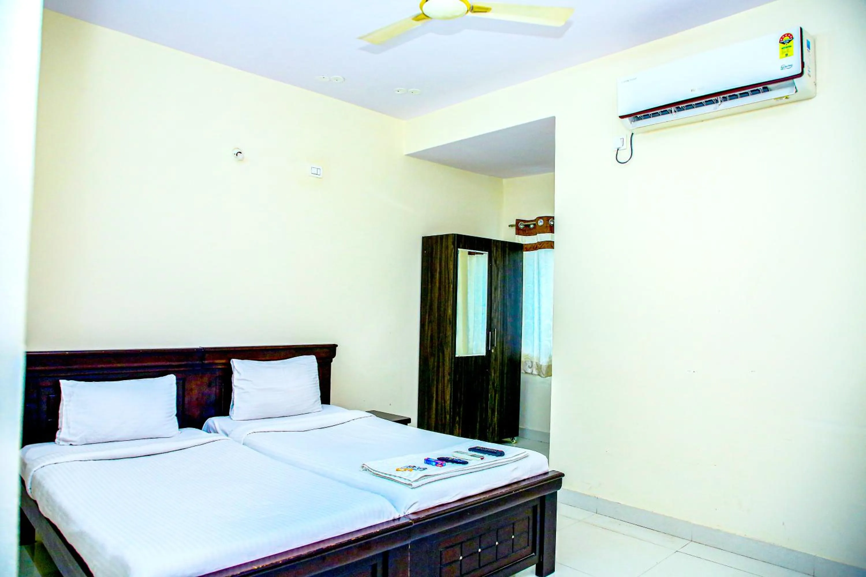 Bed in Sri Ramanjaneya Nilayam