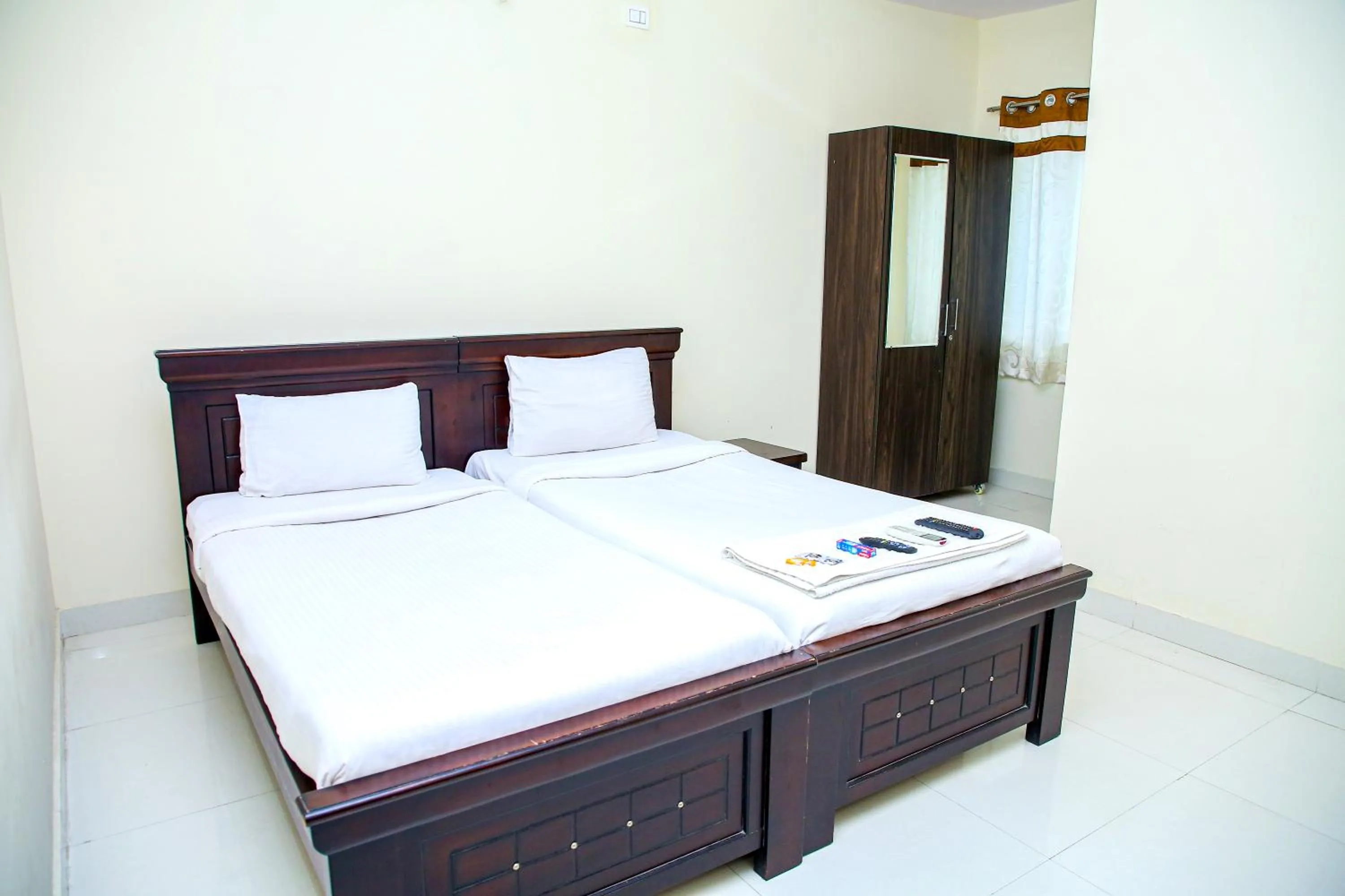 Bed in Sri Ramanjaneya Nilayam