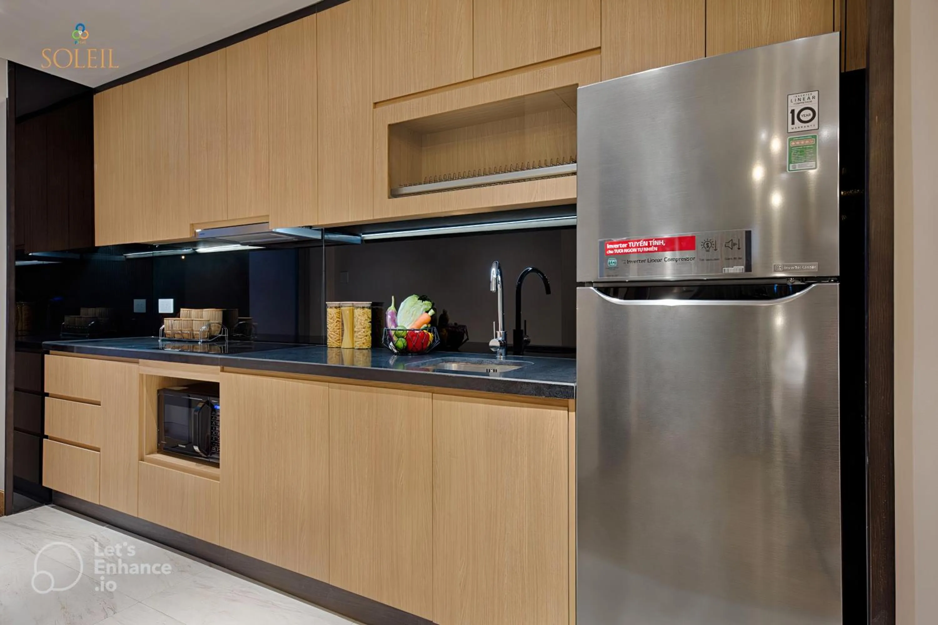 kitchen in Wyndham Soleil Danang - Free Schedule Airport Shuttle