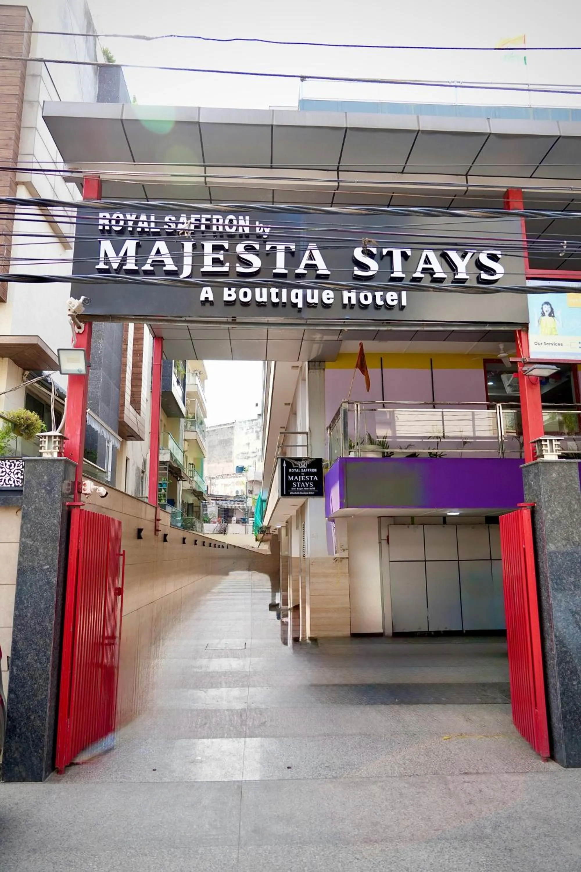 Property logo or sign in Hotel Royal Saffron by Majesta Stays