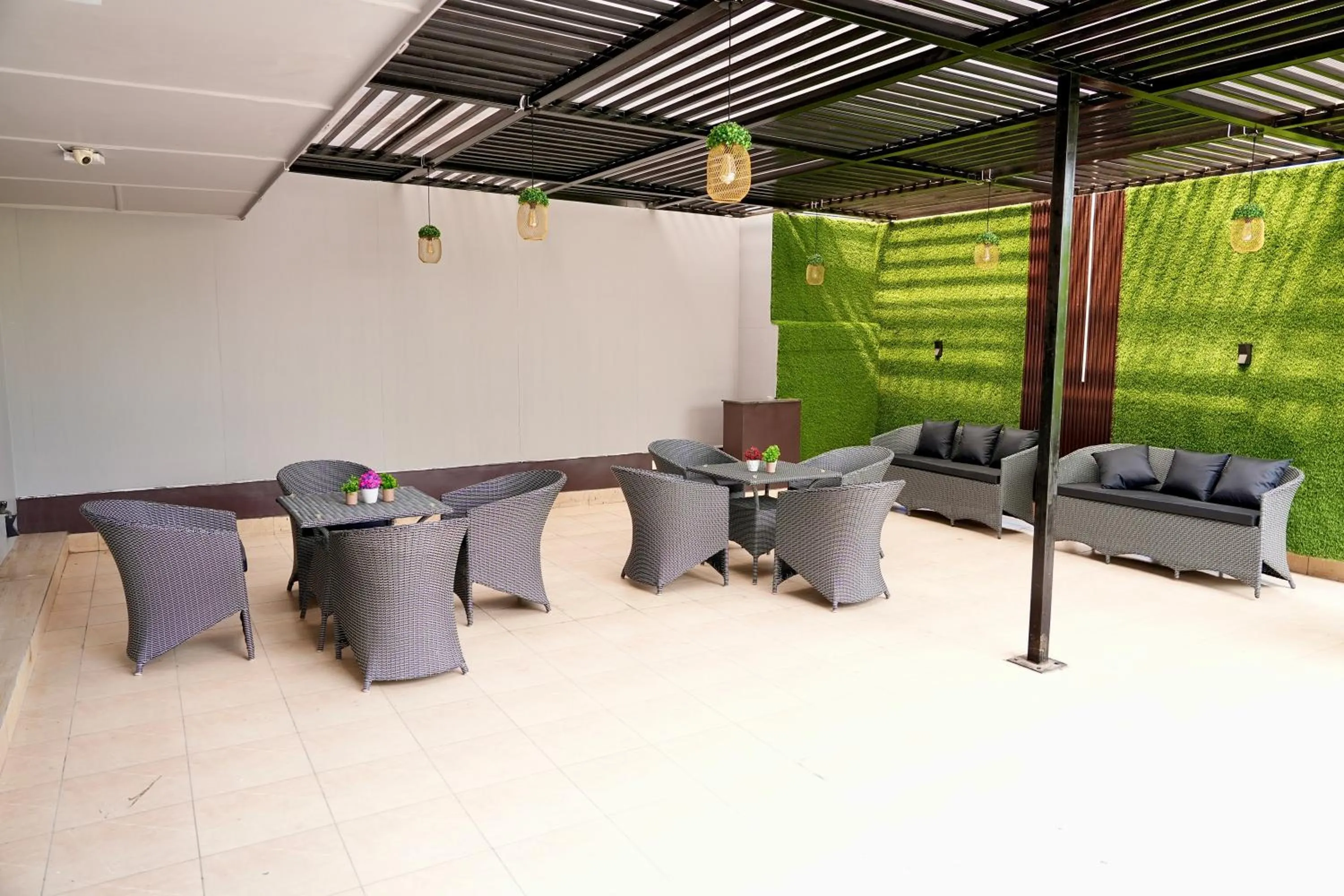 Seating area in Hotel Royal Saffron by Majesta Stays