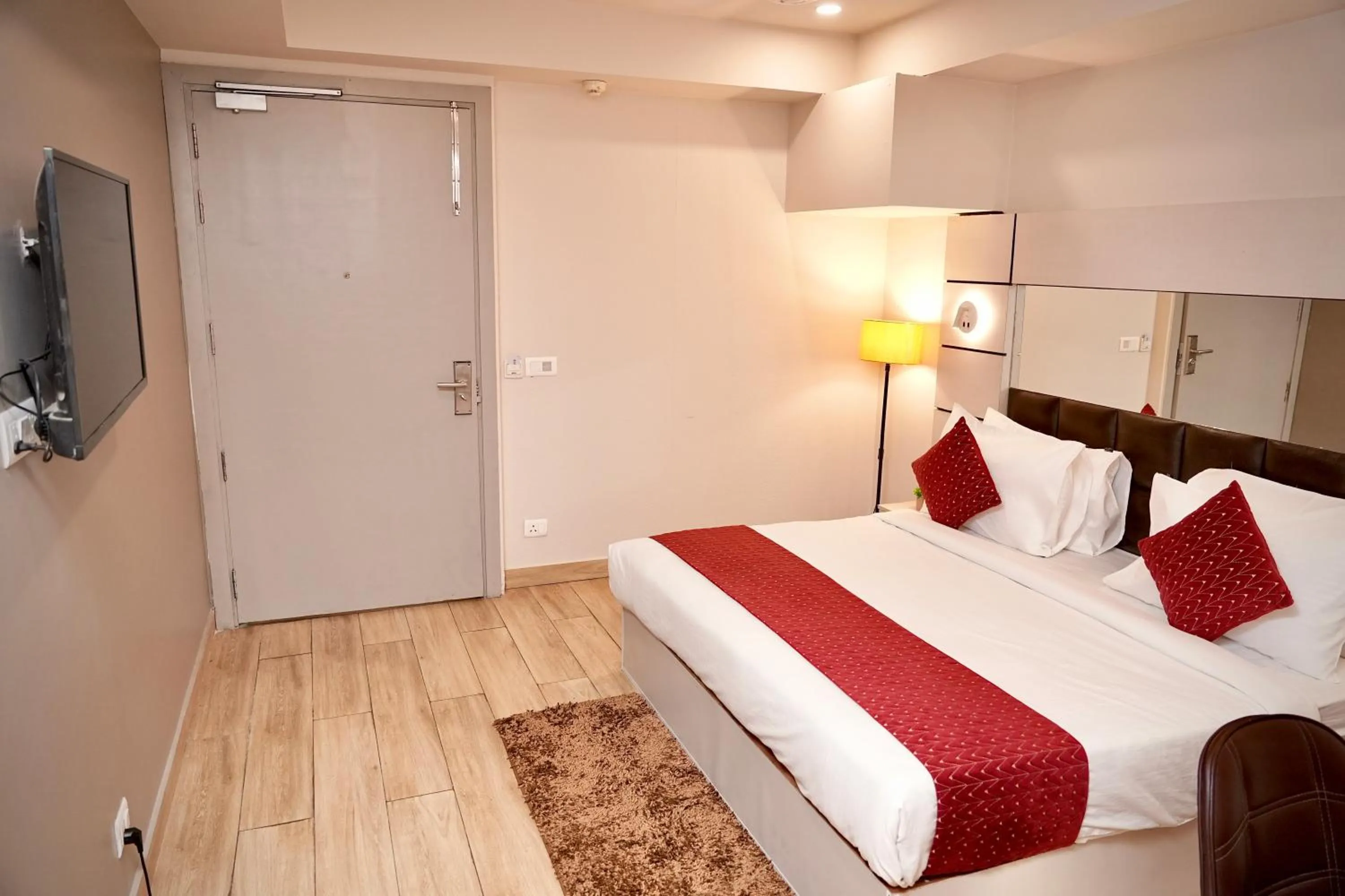 Communal lounge/ TV room, Bed in Hotel Royal Saffron by Majesta Stays