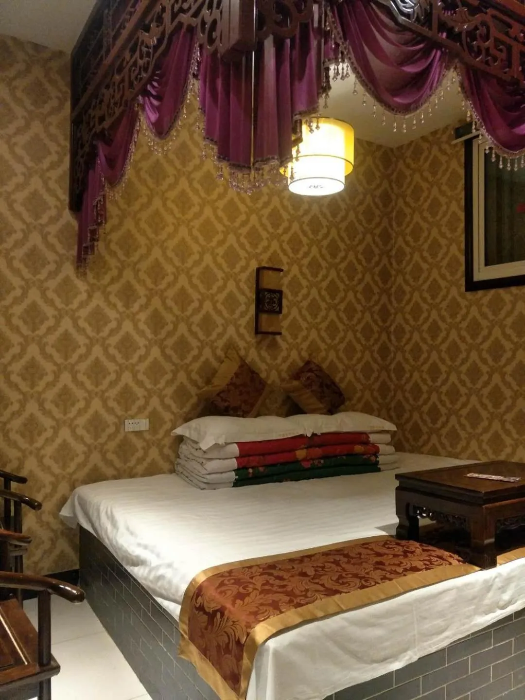 Bed in Pingyao Jiaxin Guesthouse