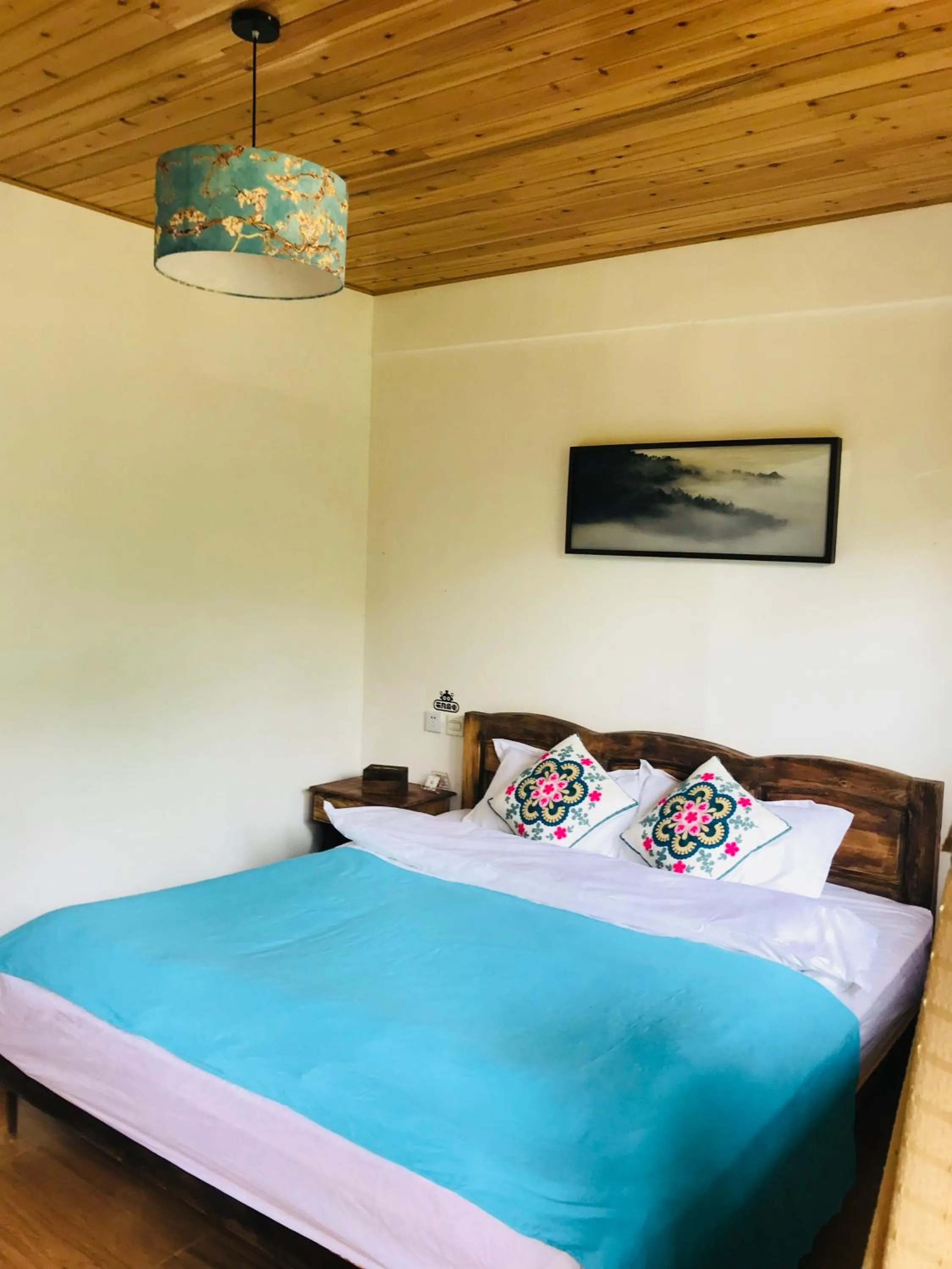 Bed in Tourist Courtyard Hotel