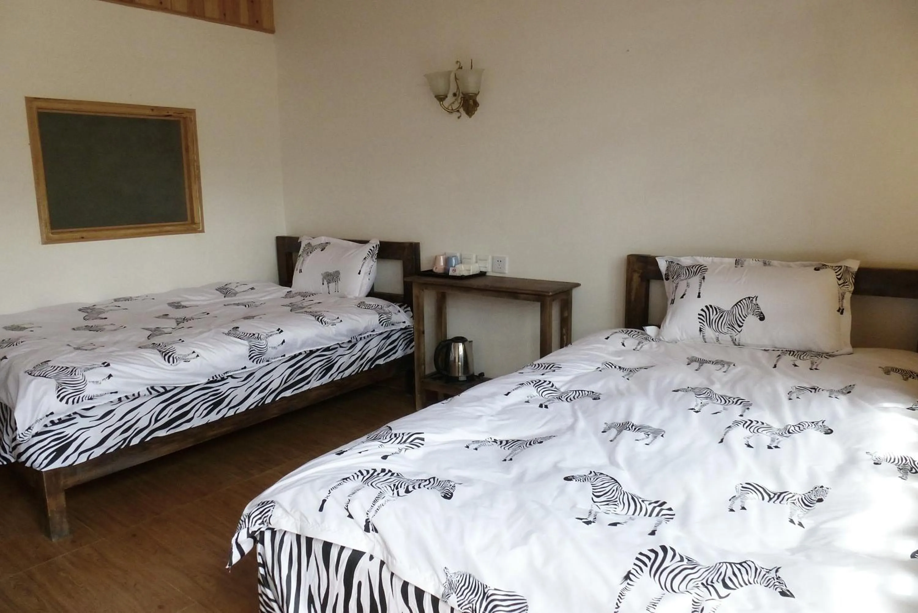 Bed in Tourist Courtyard Hotel