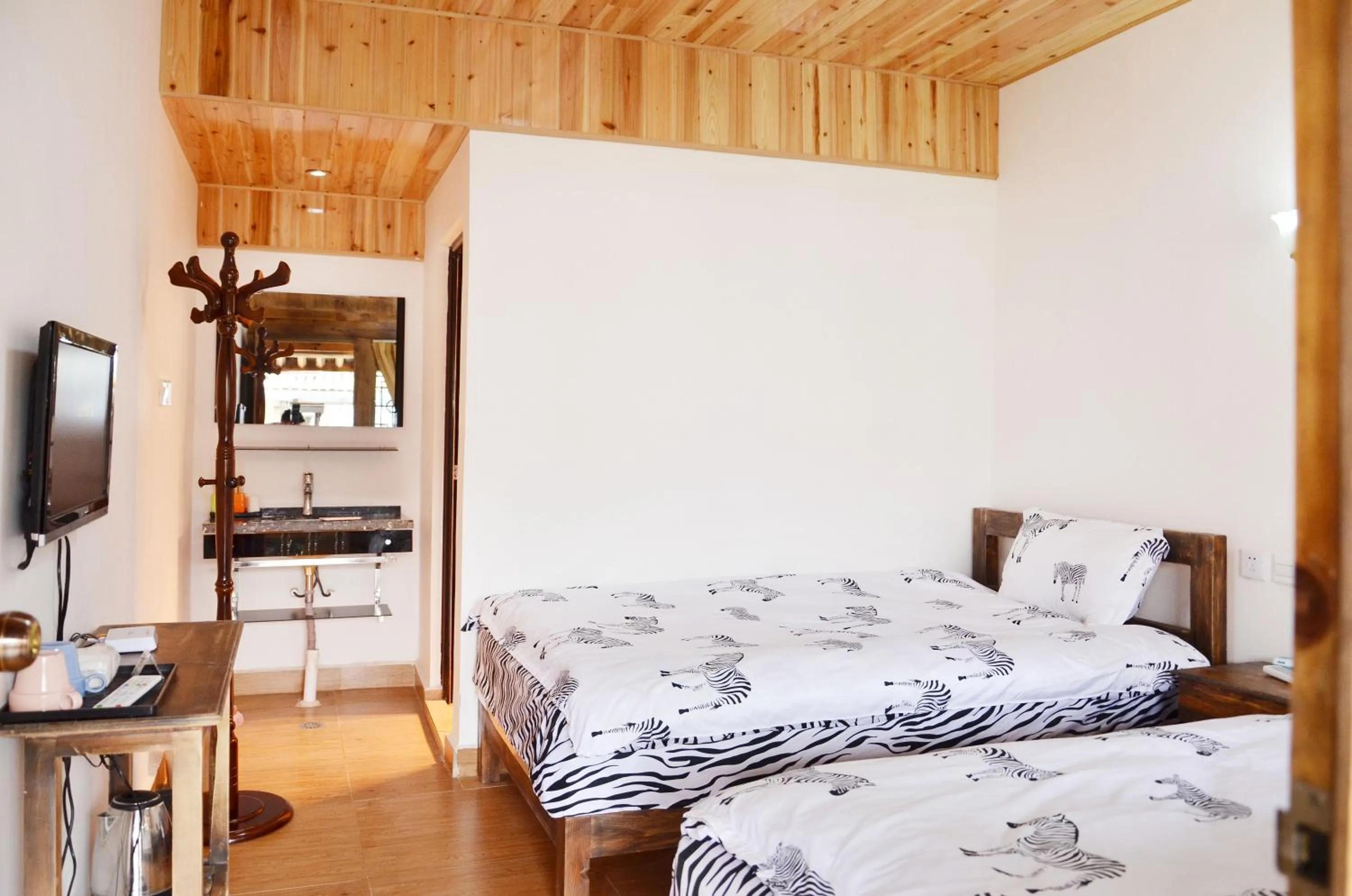 Bed in Tourist Courtyard Hotel