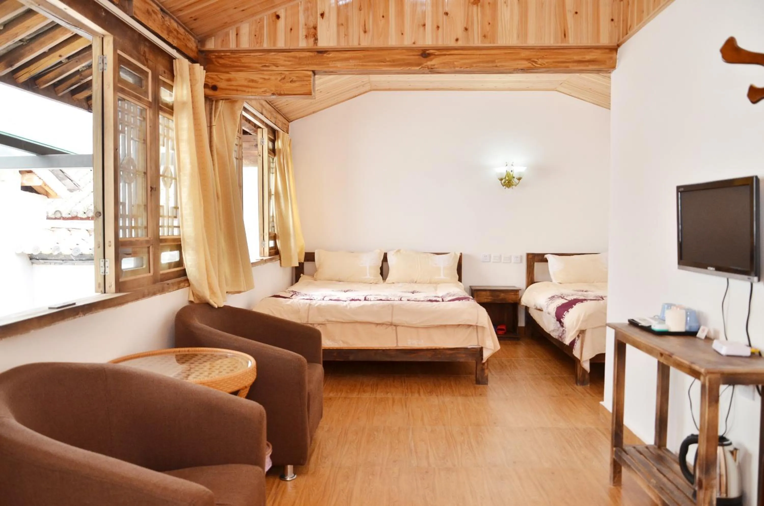 Bed in Tourist Courtyard Hotel