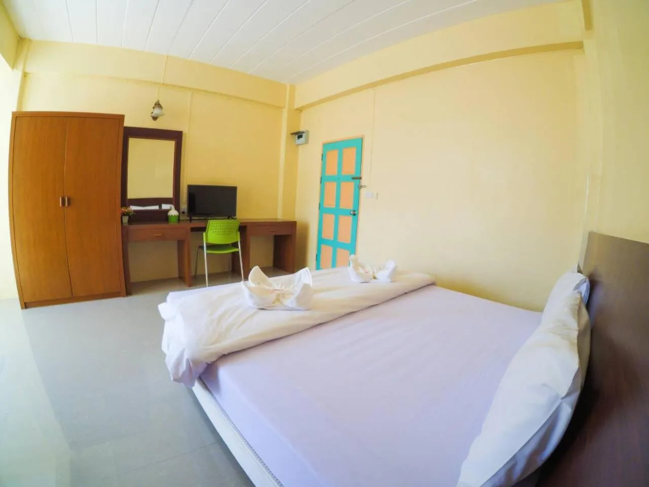 Bed in Wansiri Mansion