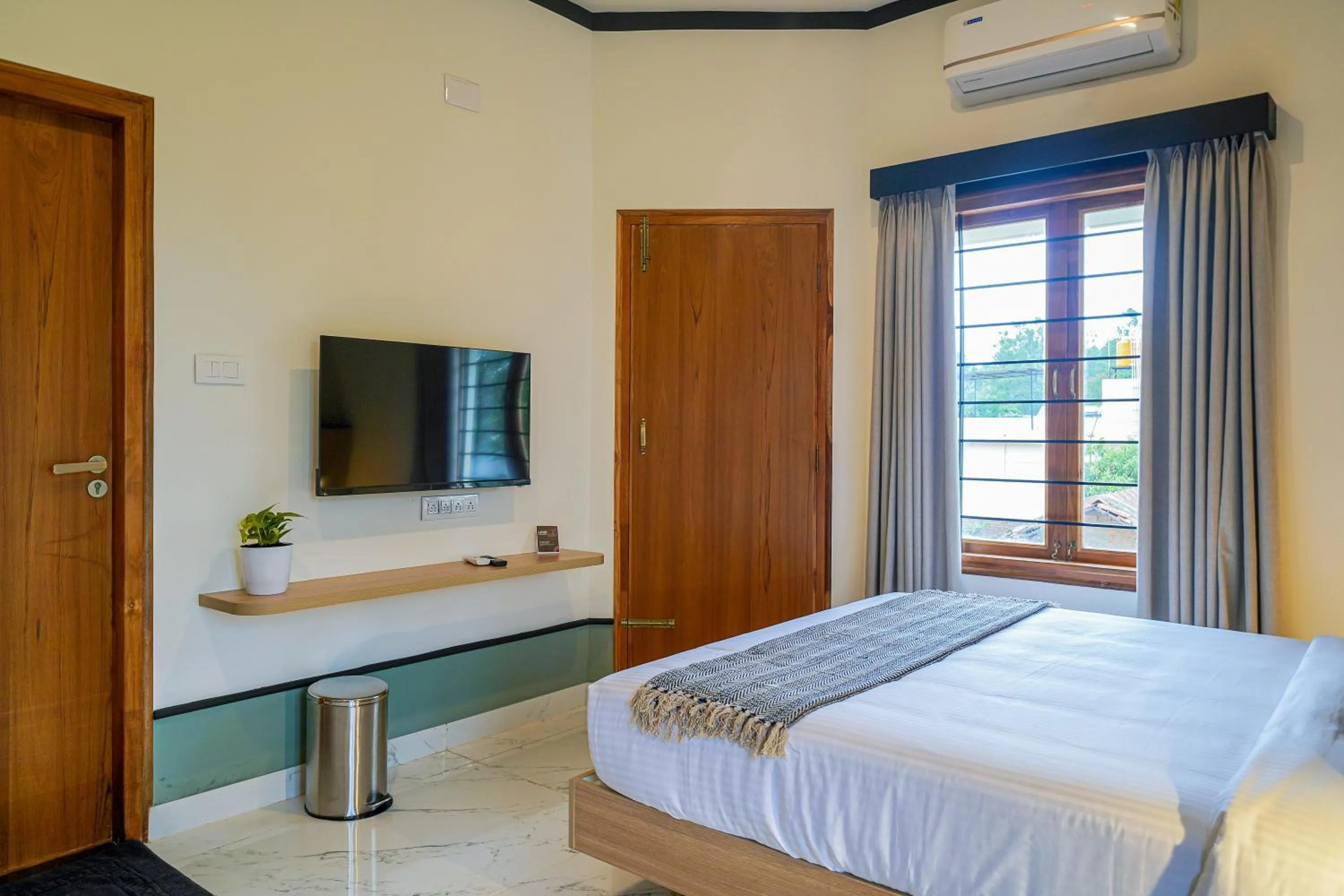 Bed in Olive Hotel Chikkamagalur by Embassy Group