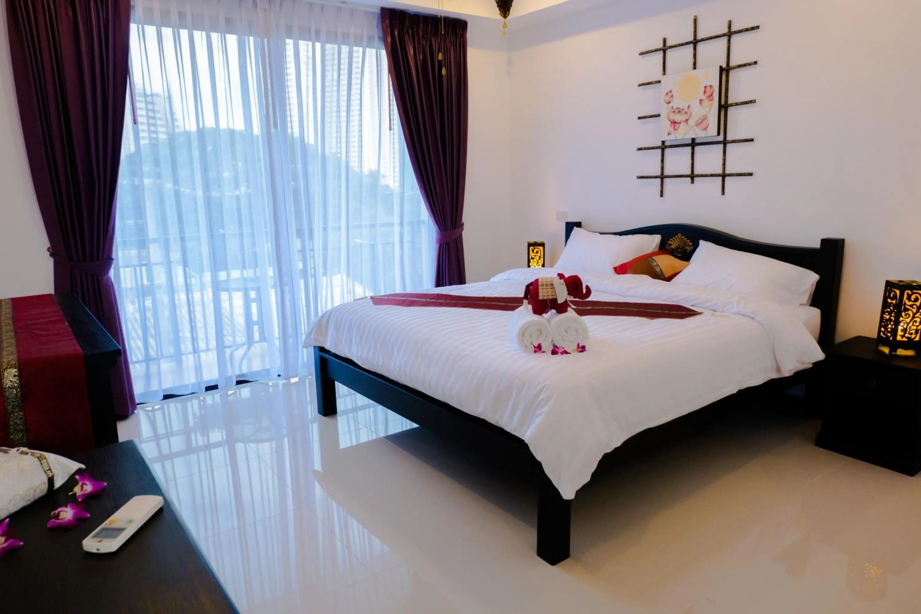 Bed in Swiss Paradise Boutique Villa