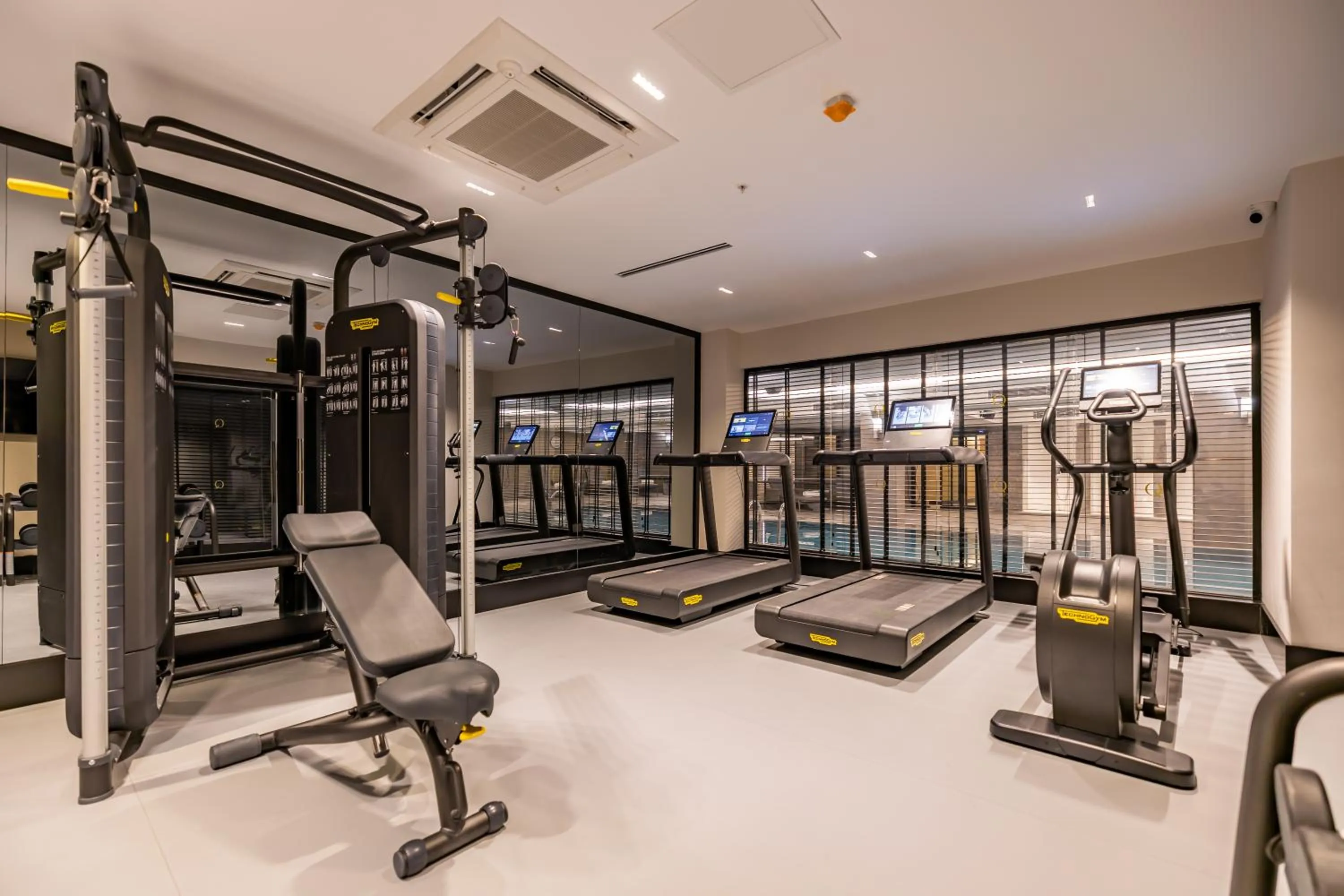 Fitness centre/facilities in Qlusive Hotel