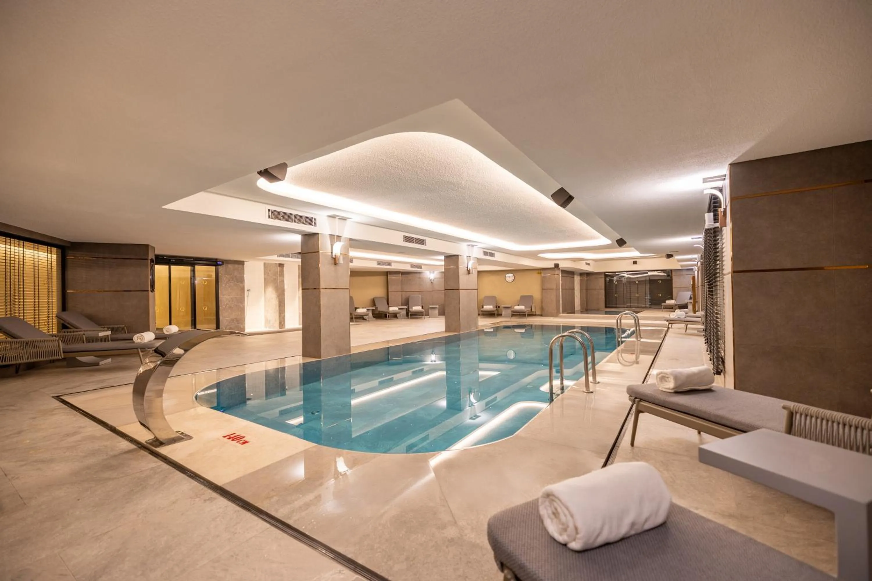 Swimming pool in Qlusive Hotel