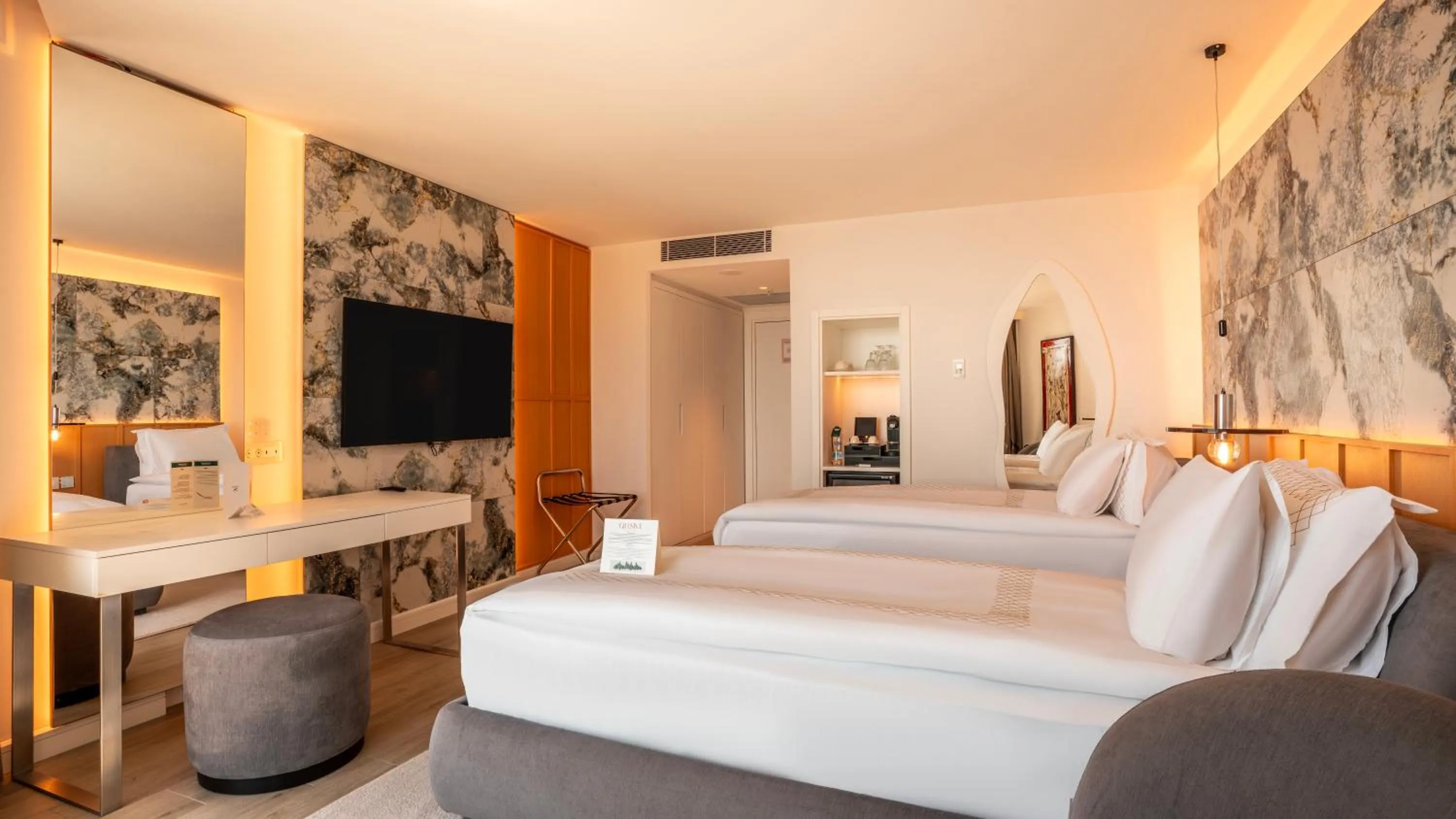 Bed in Qlusive Hotel