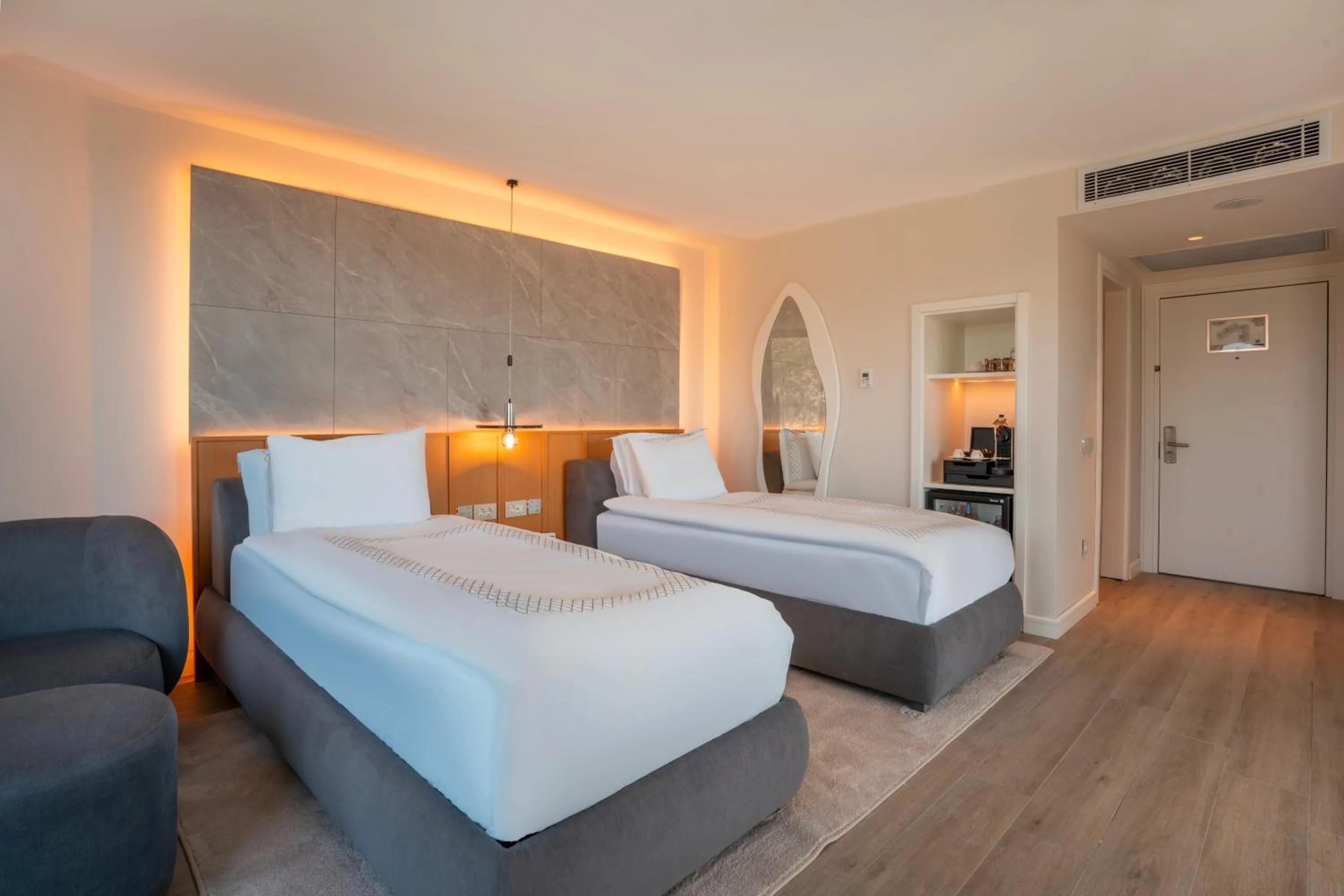 Bed in Qlusive Hotel