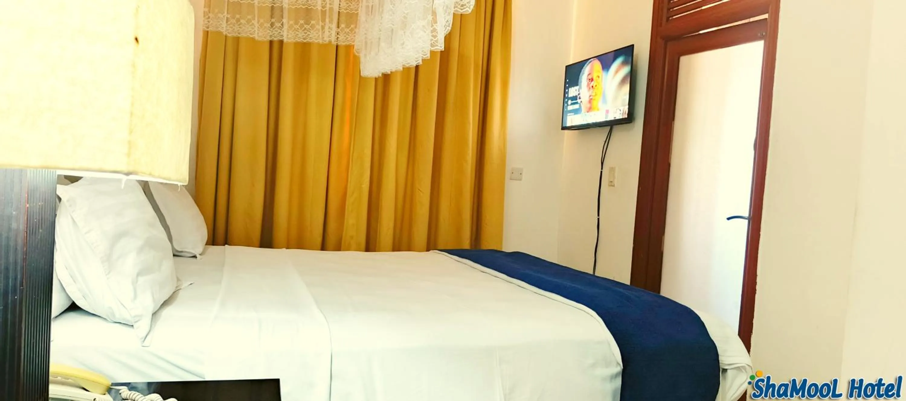 Bed in ShaMooL Hotel
