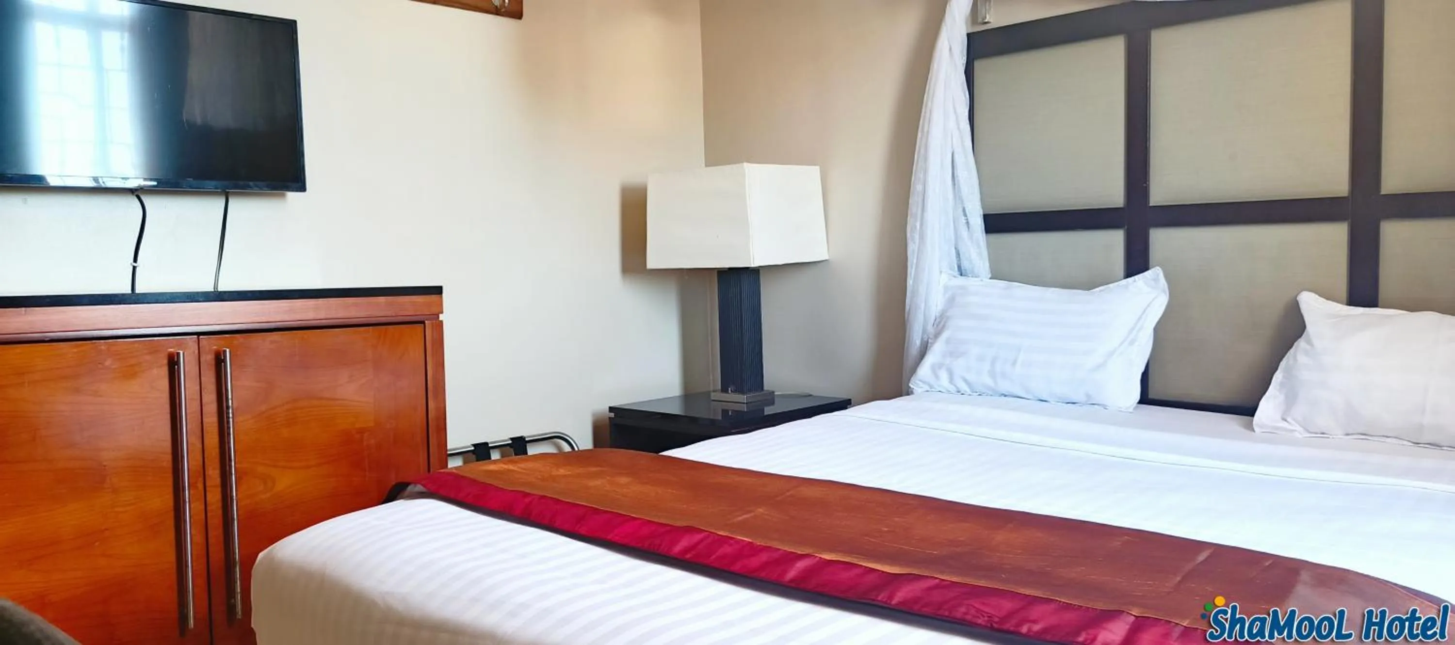 Bed in ShaMooL Hotel