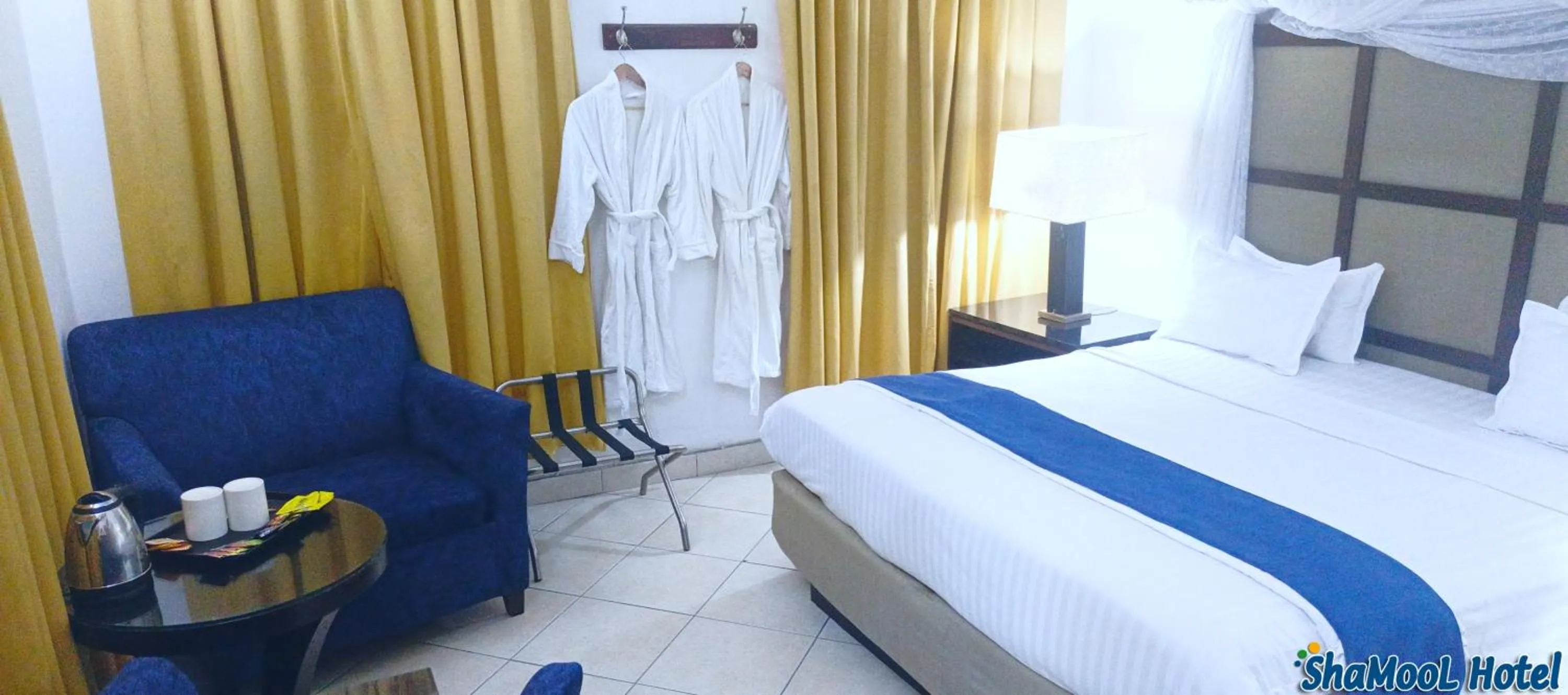 Bed in ShaMooL Hotel