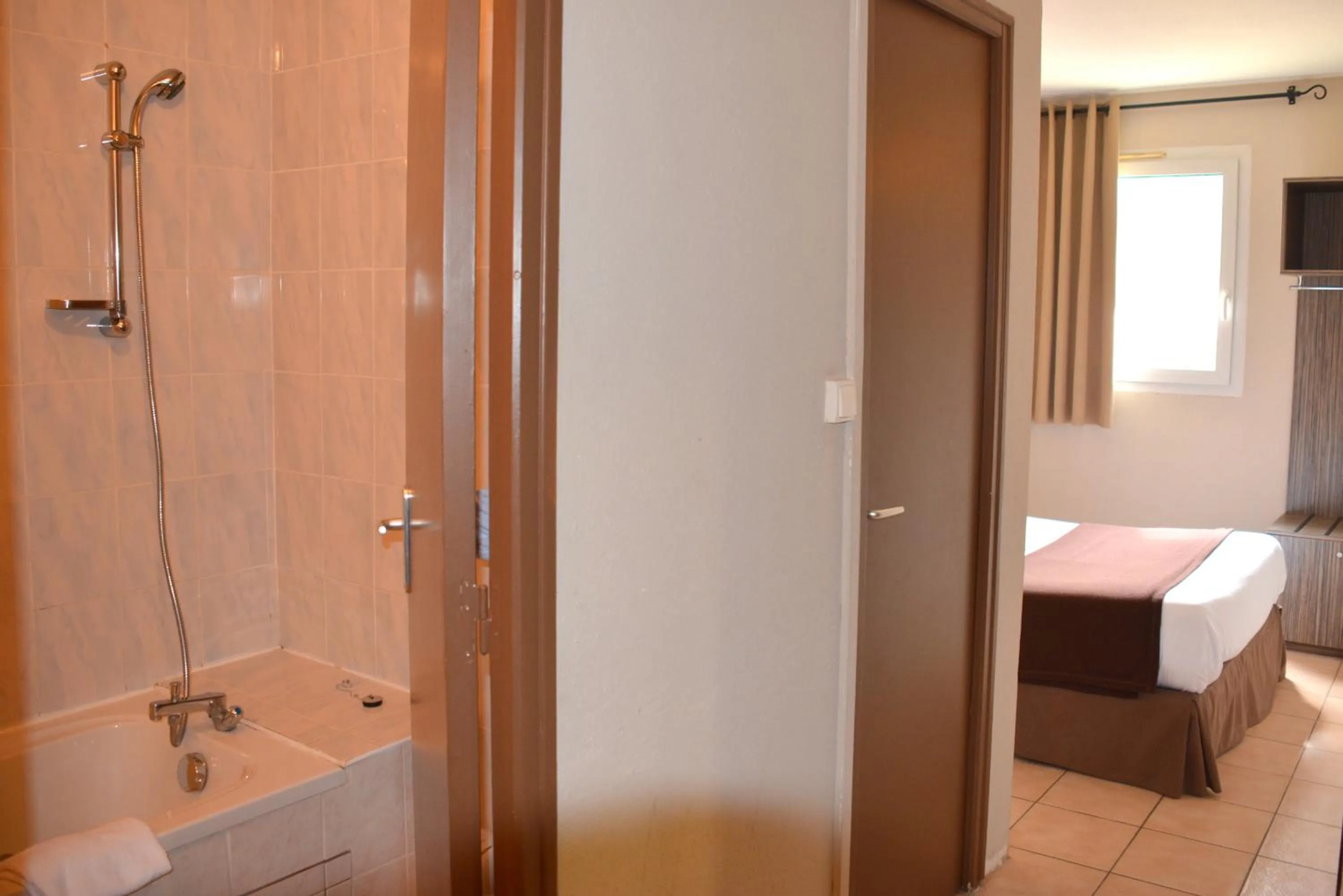 Bedroom, Bed in Hôtel Le Floreal