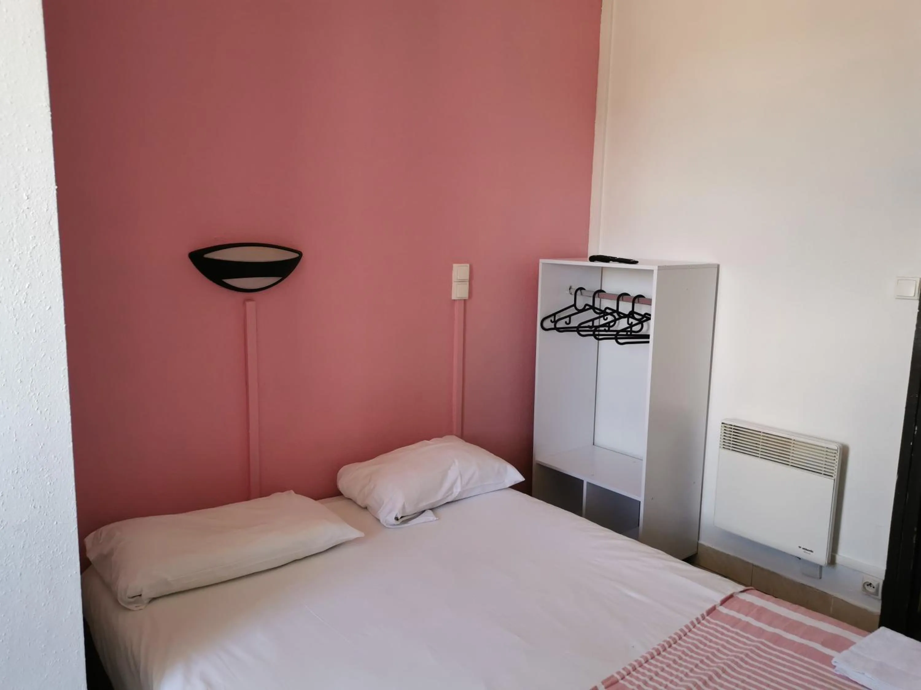 Photo of the whole room, Bed in Hôtel Le Floreal