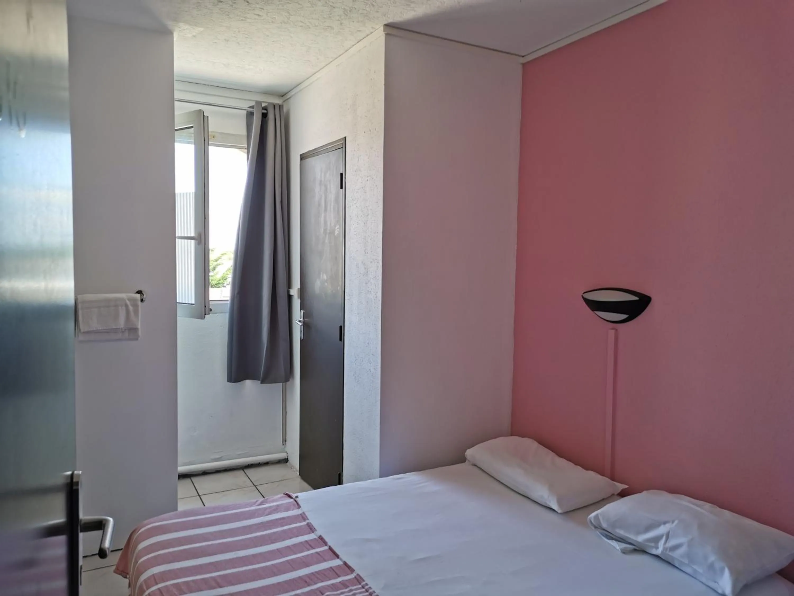 Photo of the whole room, Bed in Hôtel Le Floreal