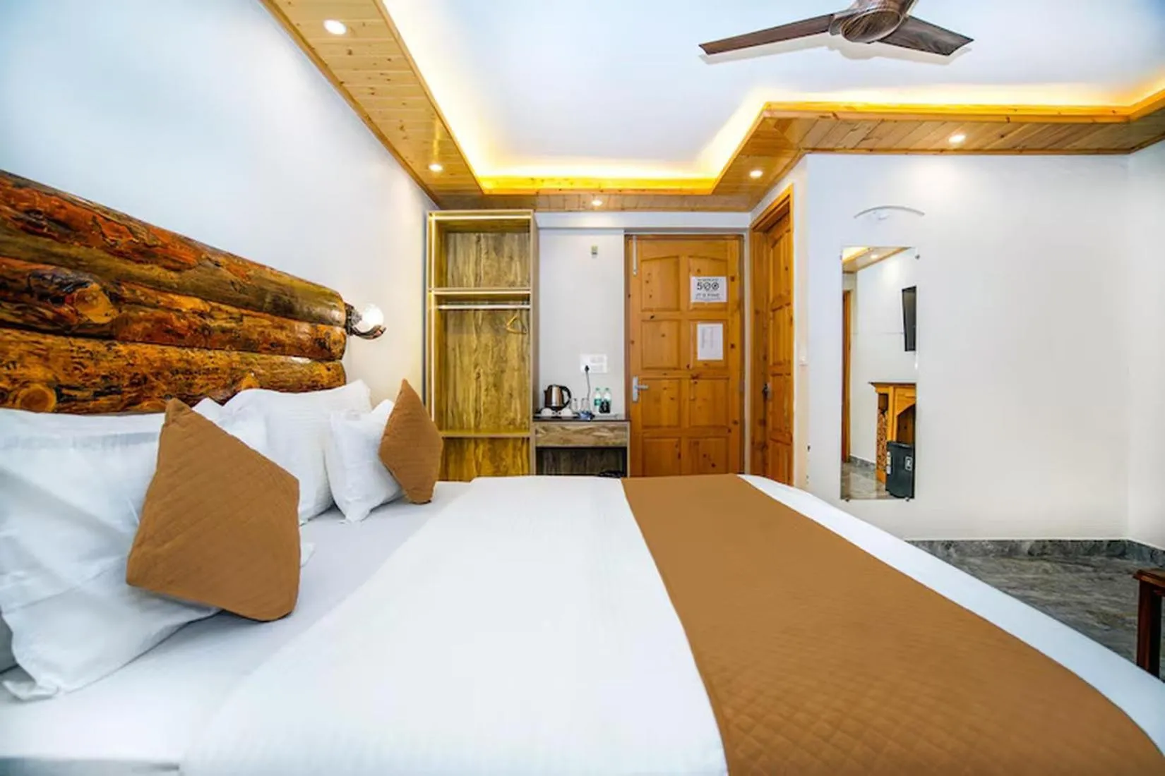Bed in The Landour Wood House