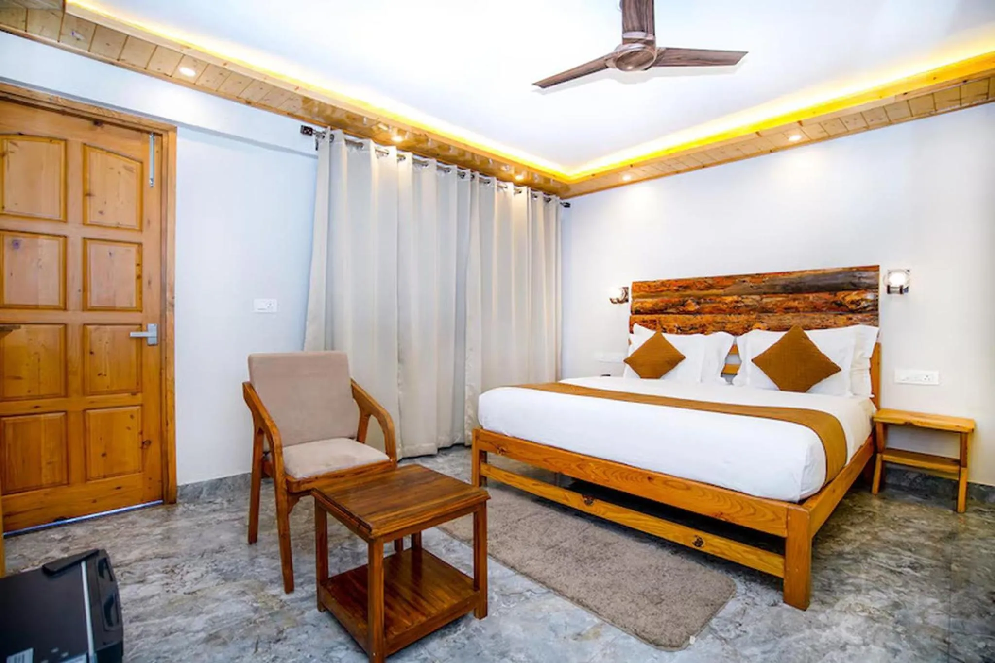 Bed in The Landour Wood House