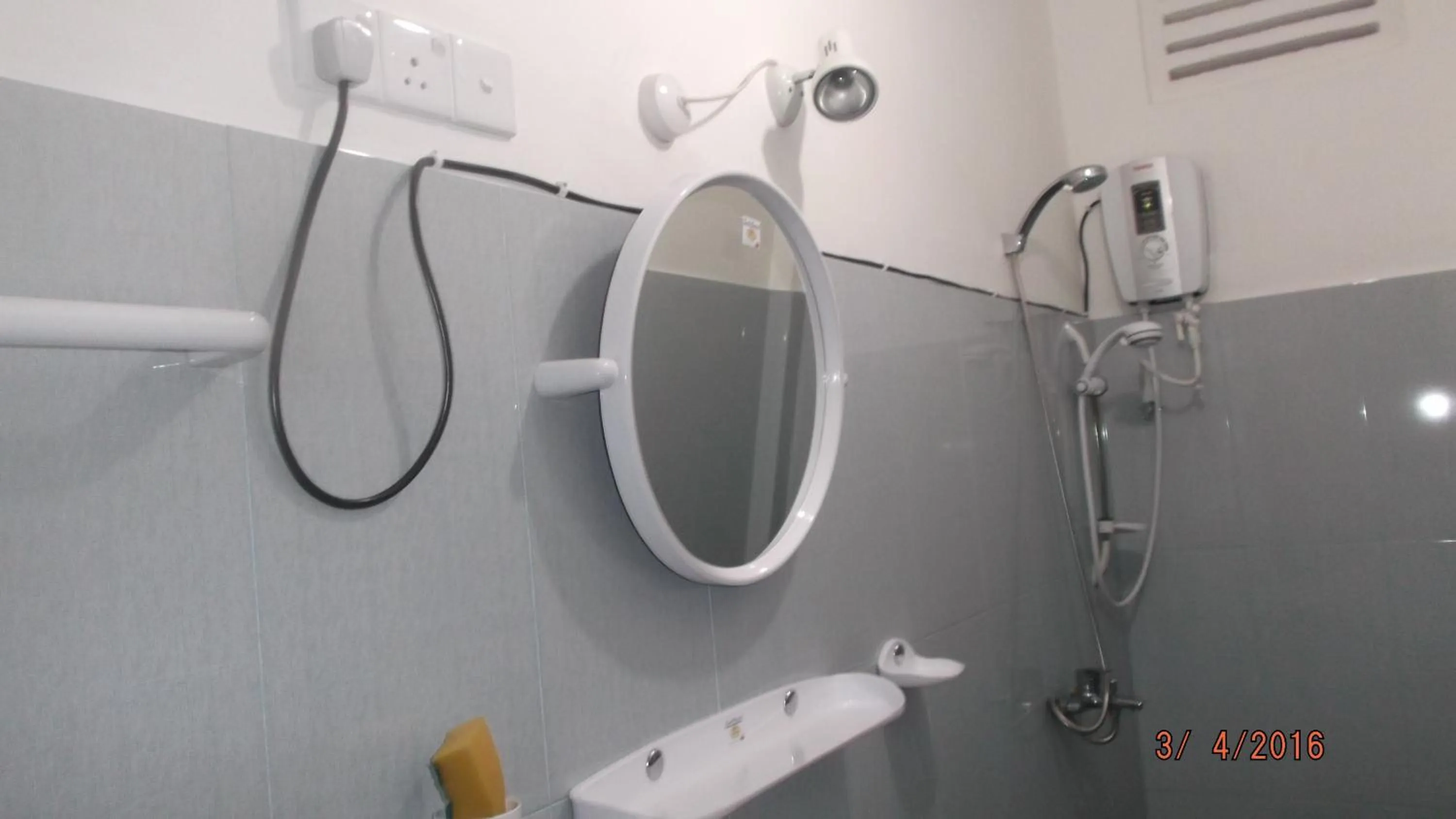 Shower in Anura Guest Inn