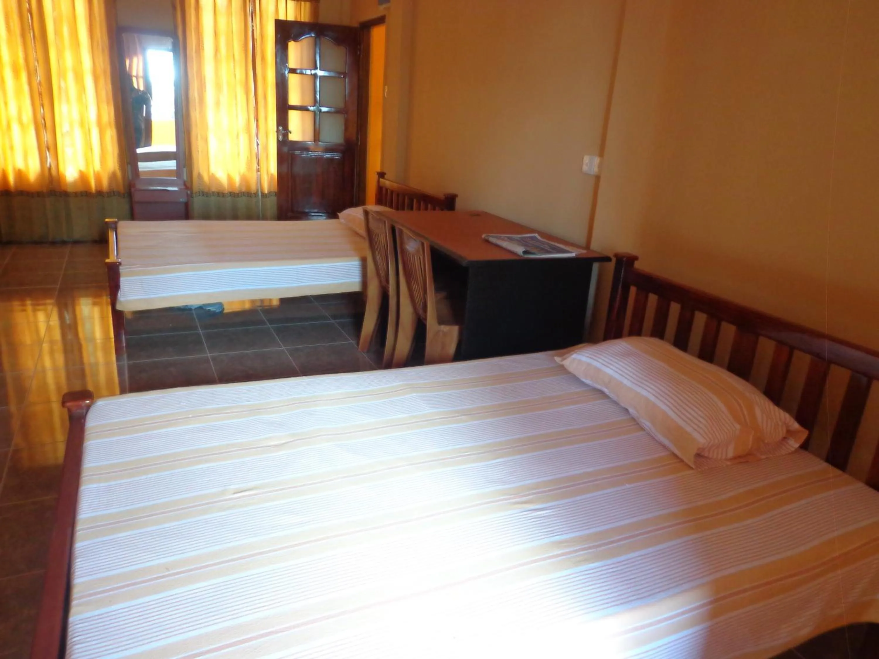 Photo of the whole room, Bed in Anura Guest Inn