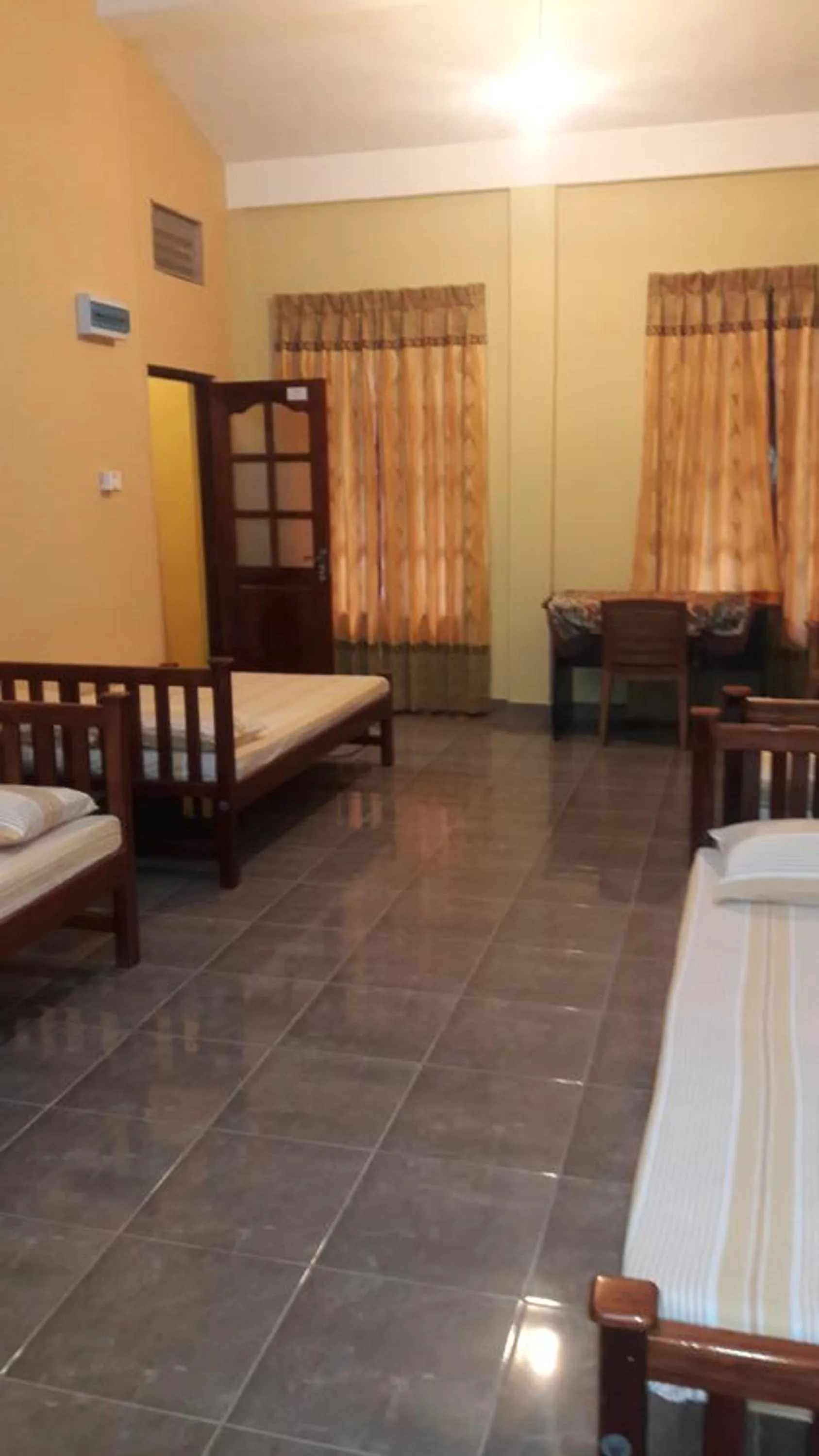 Photo of the whole room, Bed in Anura Guest Inn