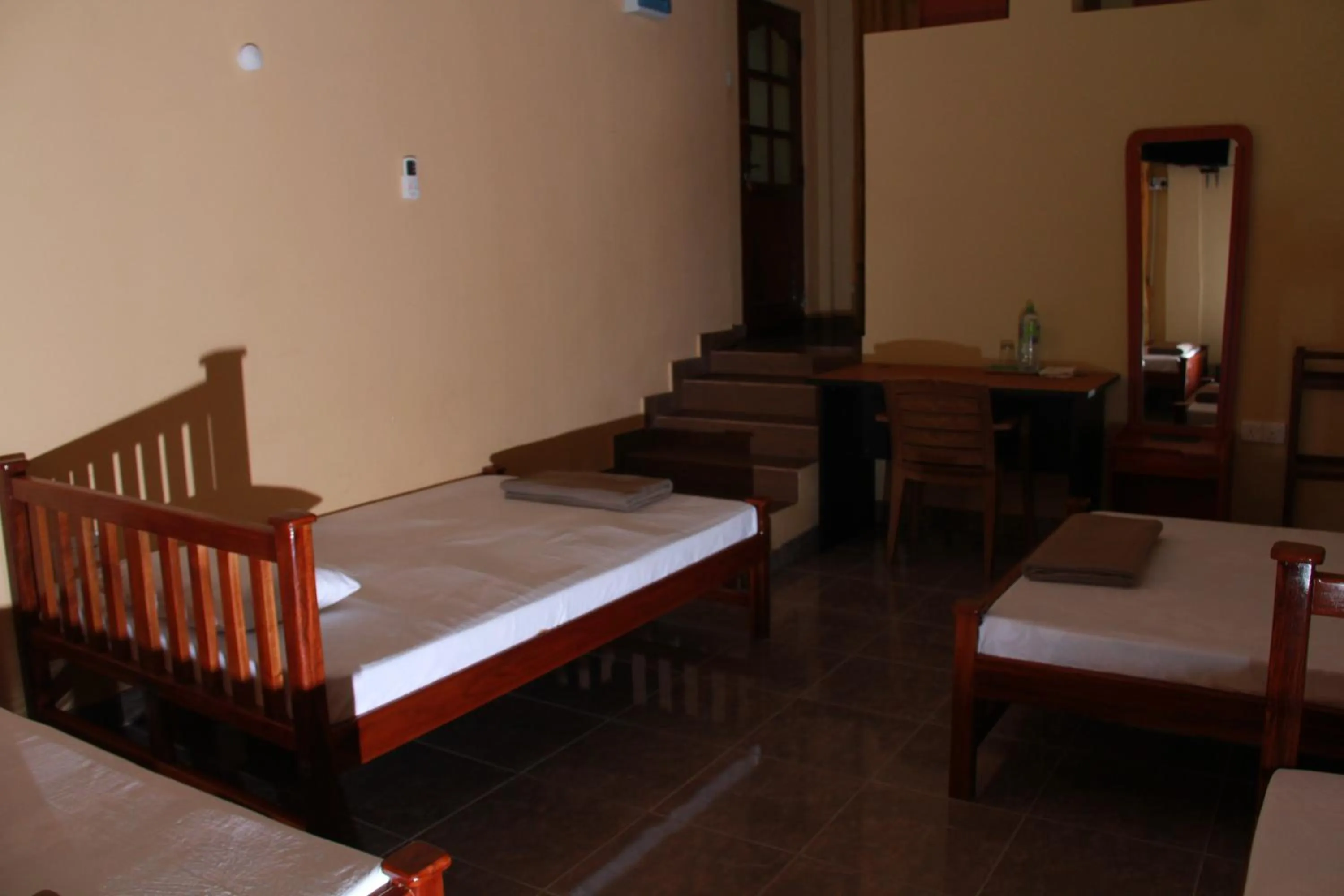 Bed in Anura Guest Inn