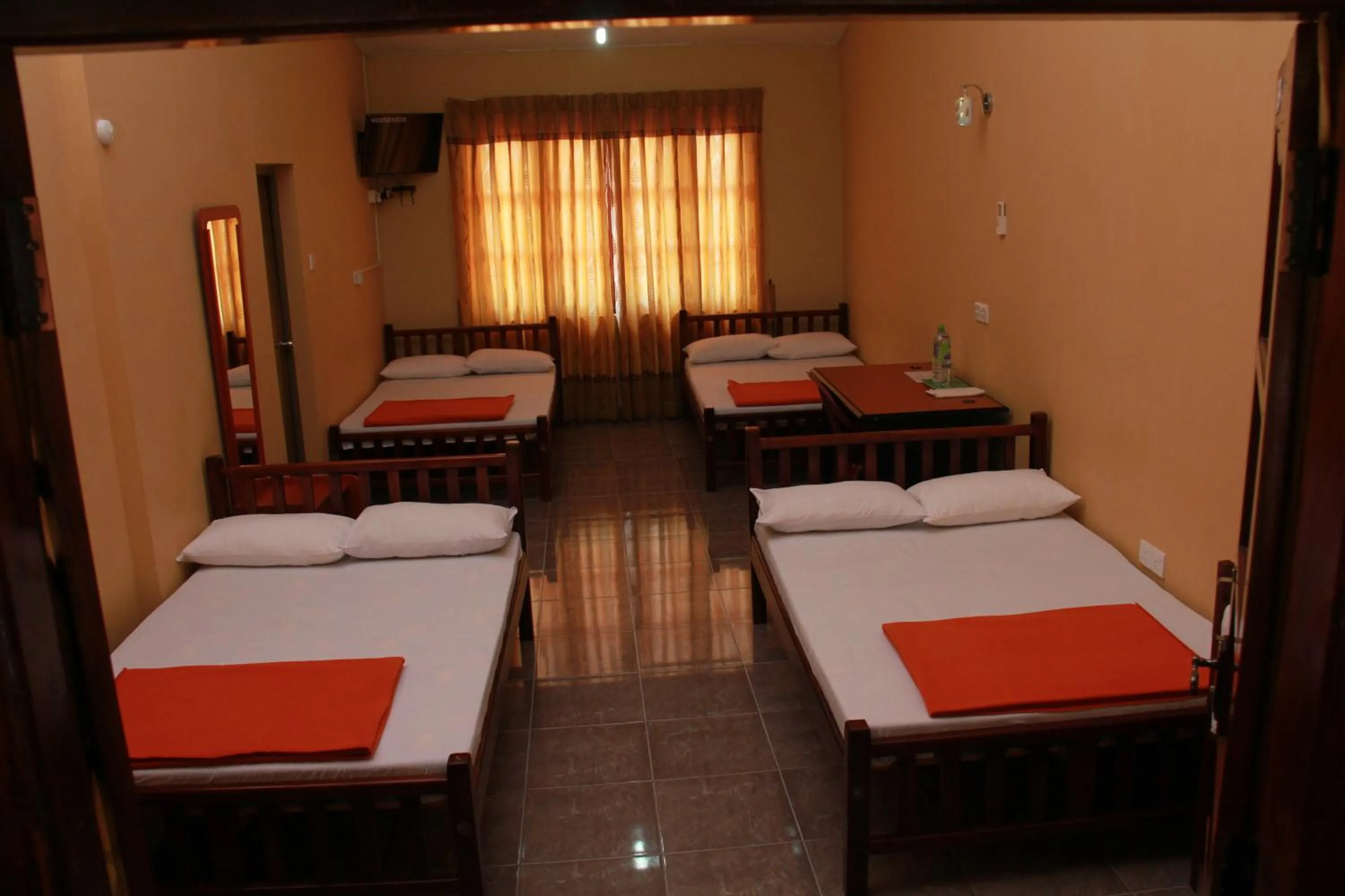 Bed in Anura Guest Inn
