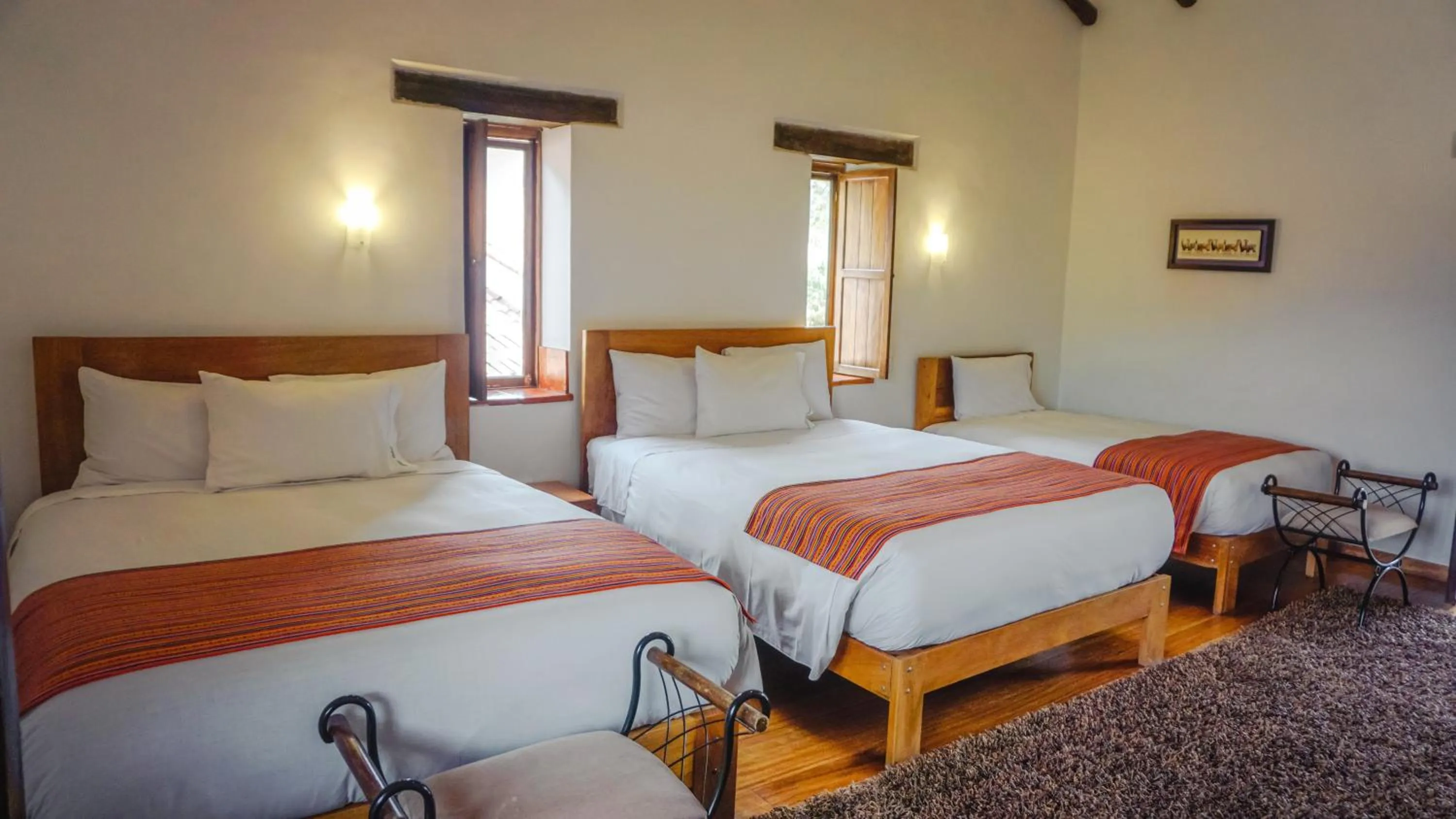 Photo of the whole room, Bed in Lizzy Wasi Urubamba