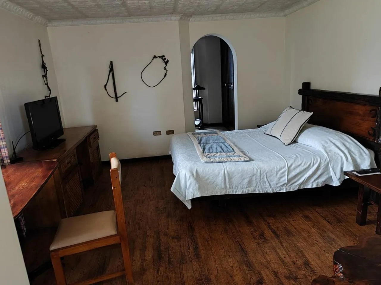 Bed in Hosteria Rumipamba De Las Rosas