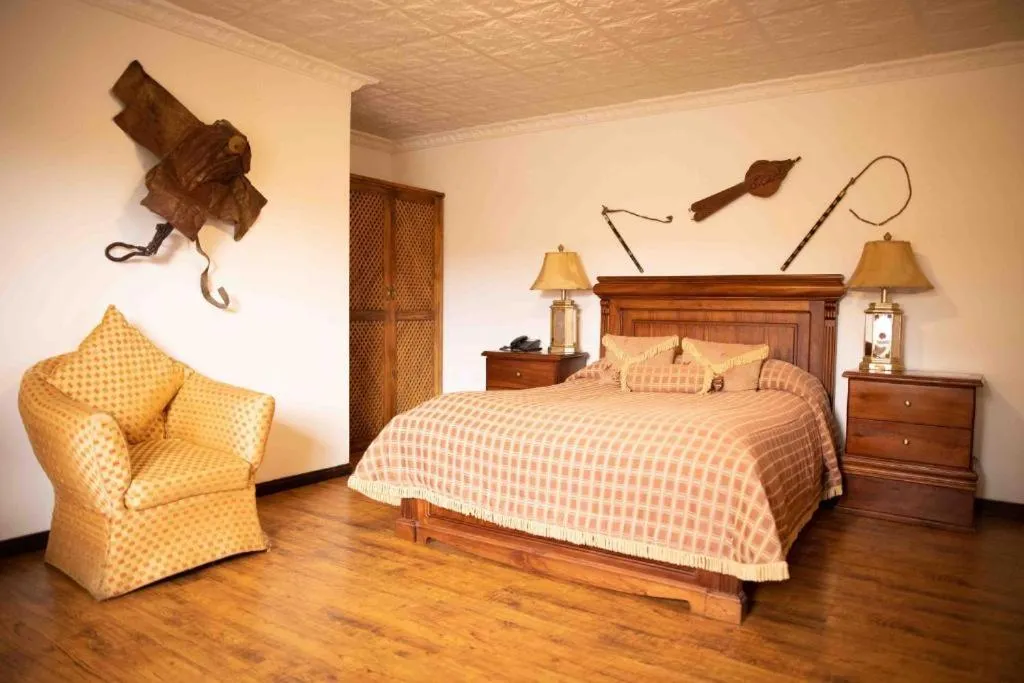 Bed in Hosteria Rumipamba De Las Rosas