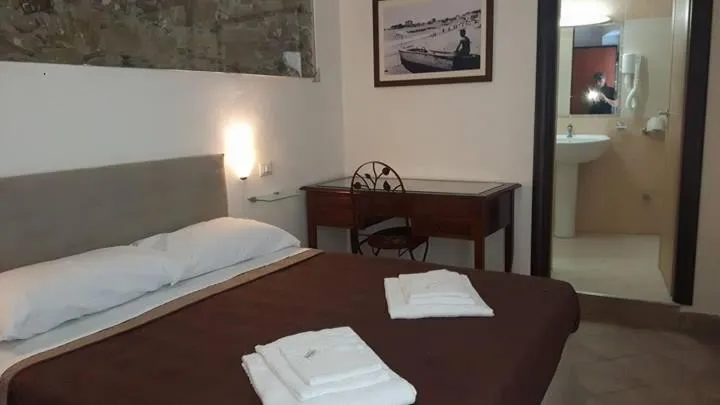 Photo of the whole room, Bed in La Marinella