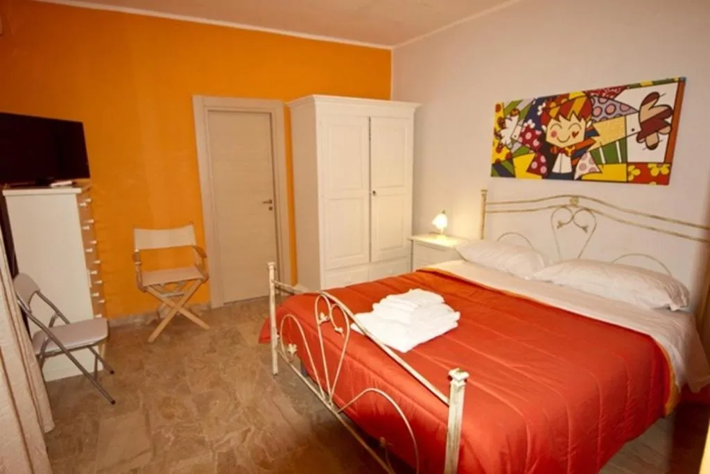 Photo of the whole room, Bed in La Marinella