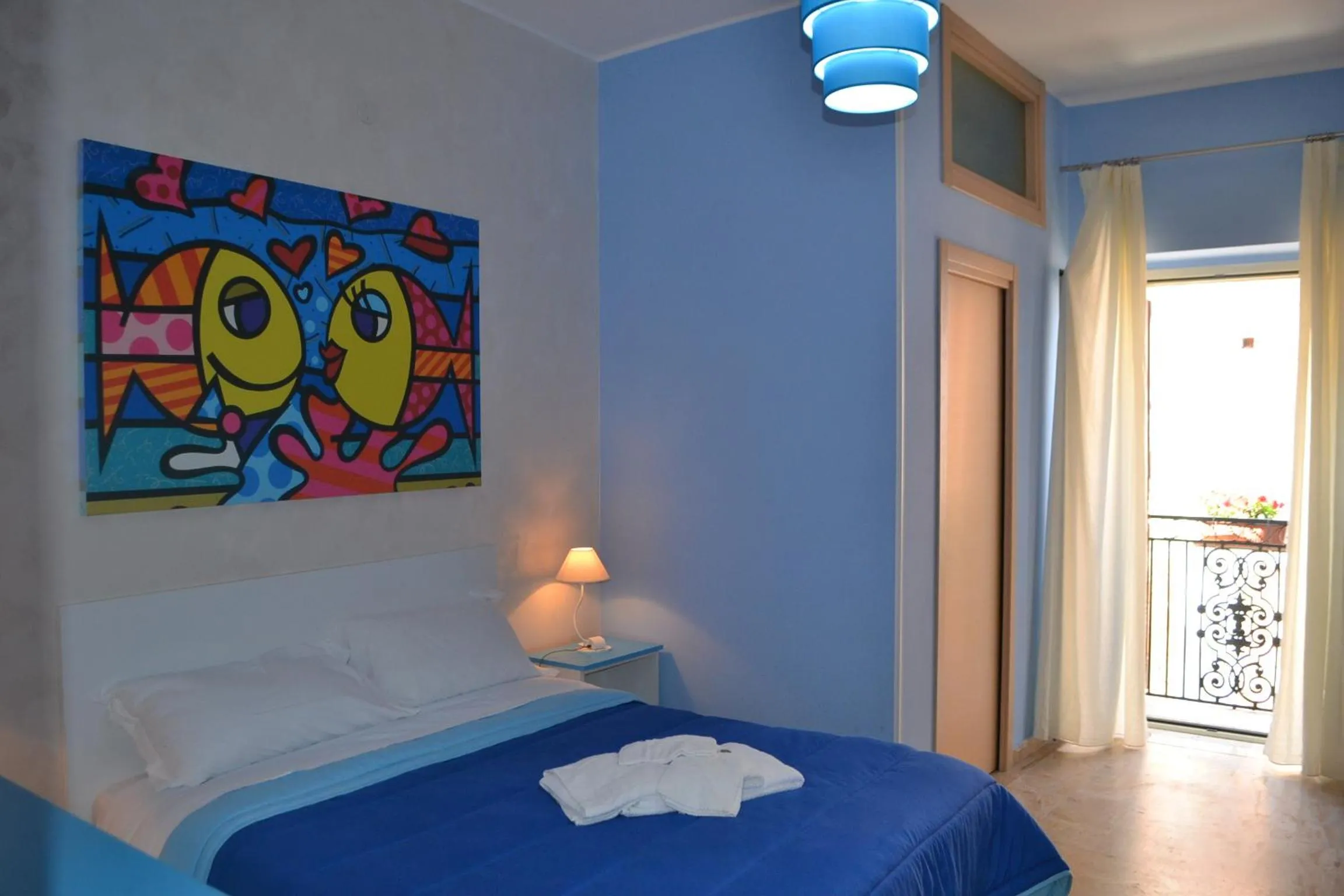 Photo of the whole room, Bed in La Marinella